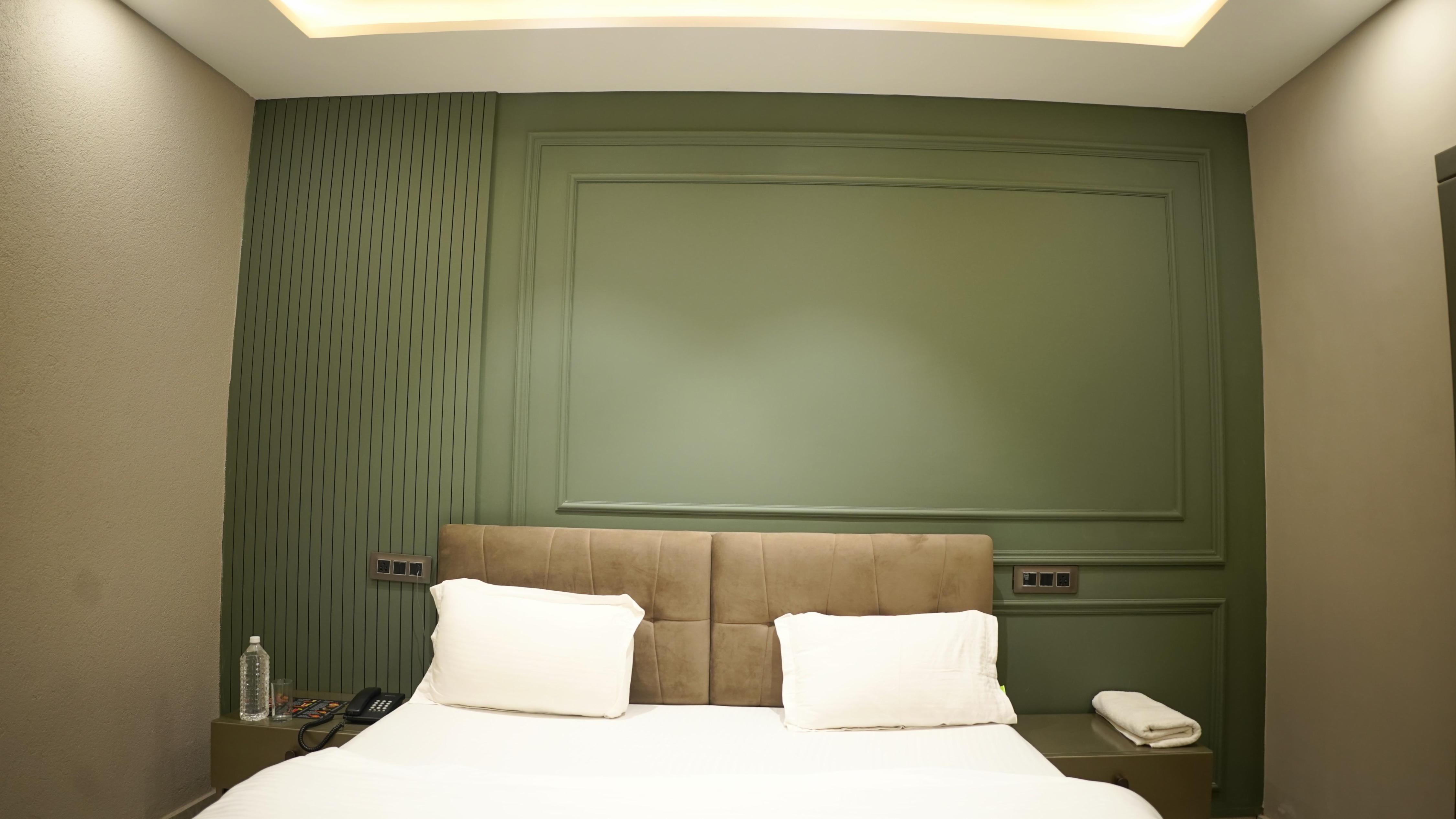 MADHAVA INN Room Type - Deluxe Room