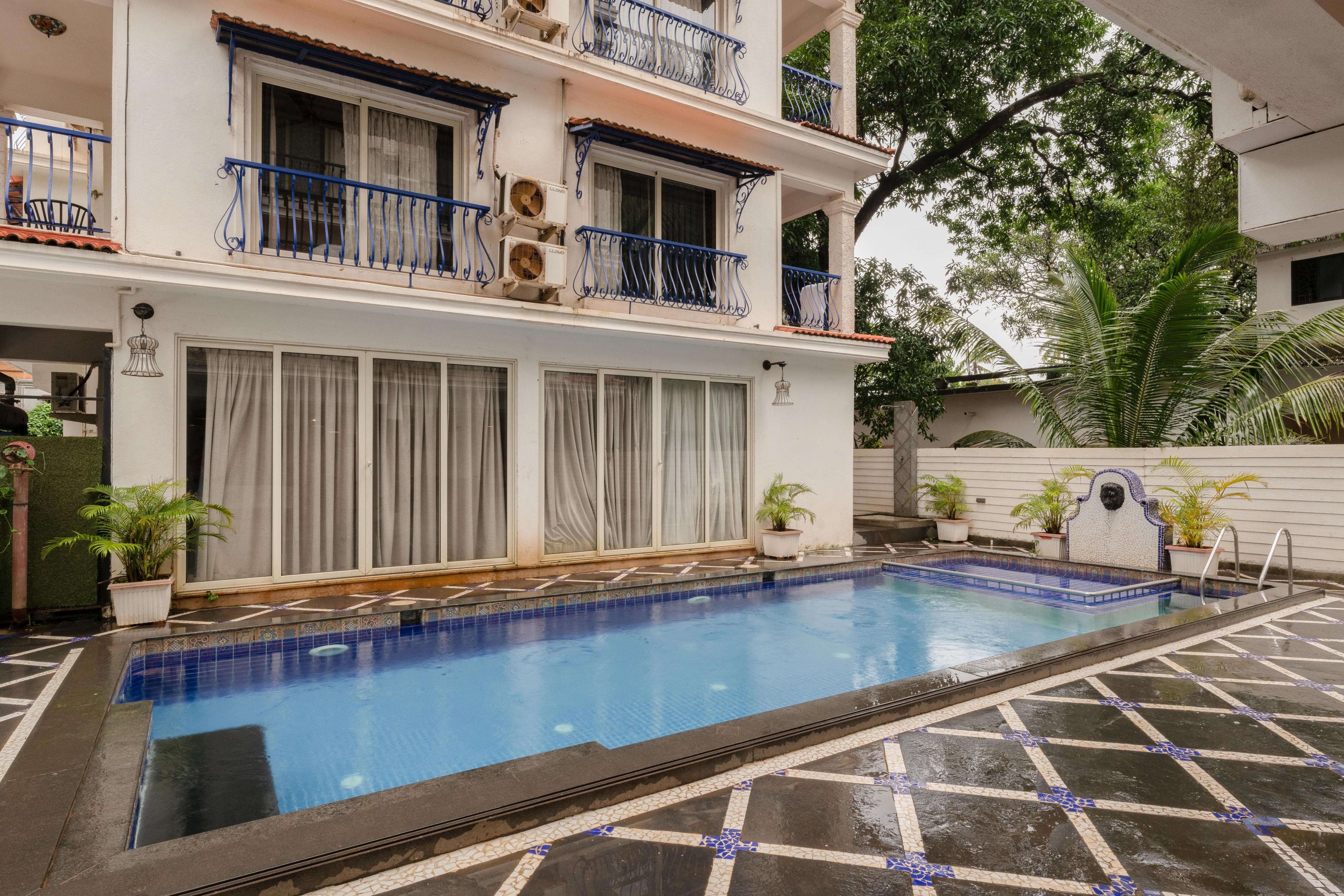 Staymaster Central 1BR | AC | Serviced | Vagator - Tap to explore photos