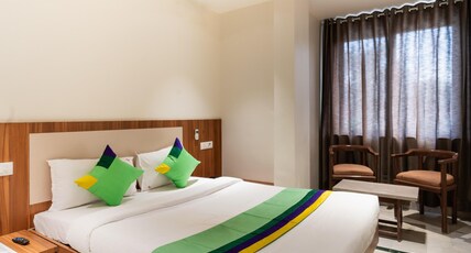 Treebo Kaveri Room Type - Deluxe Room