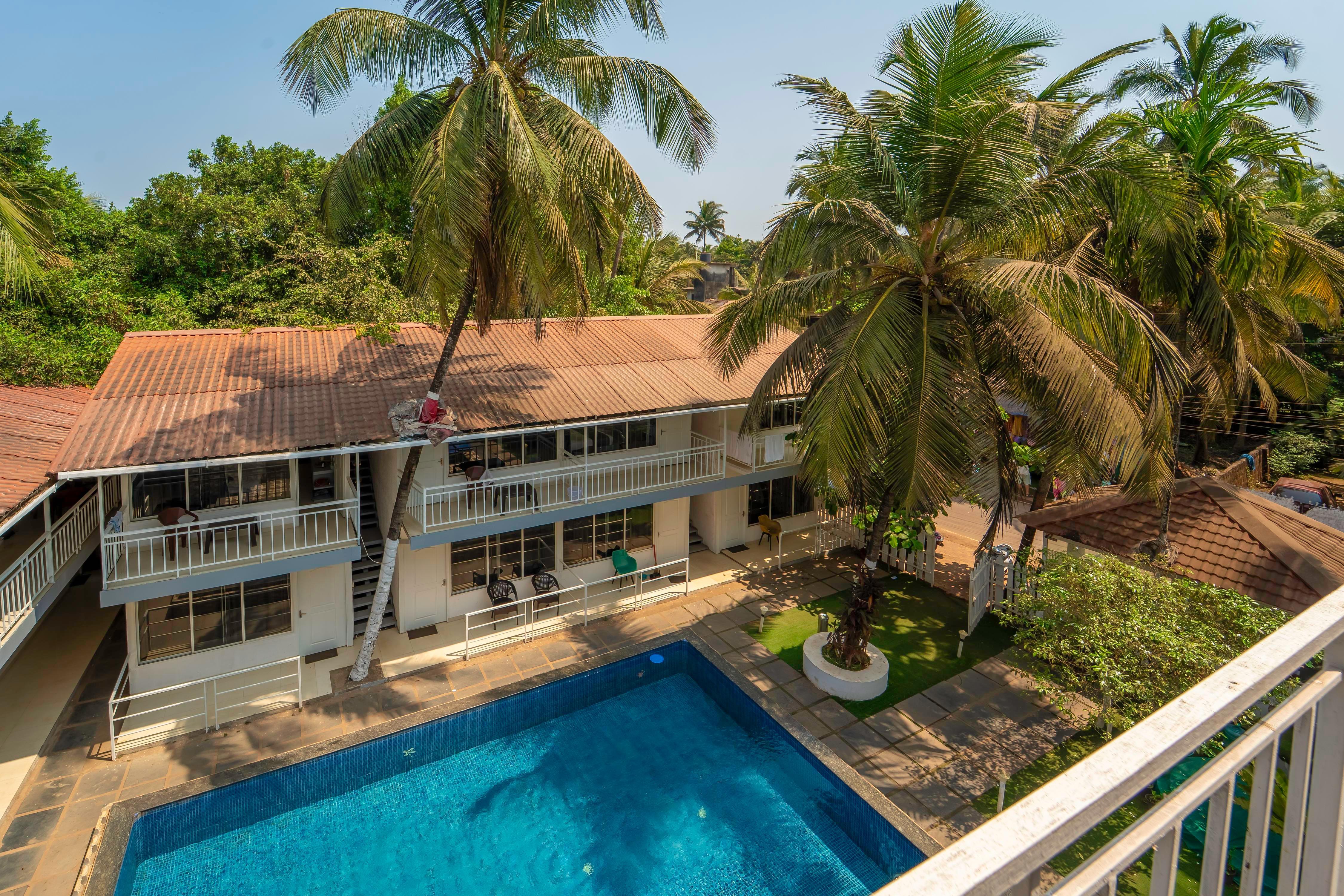 Beach Walk Resort Morjim by Feather Touch - Tap to explore photos