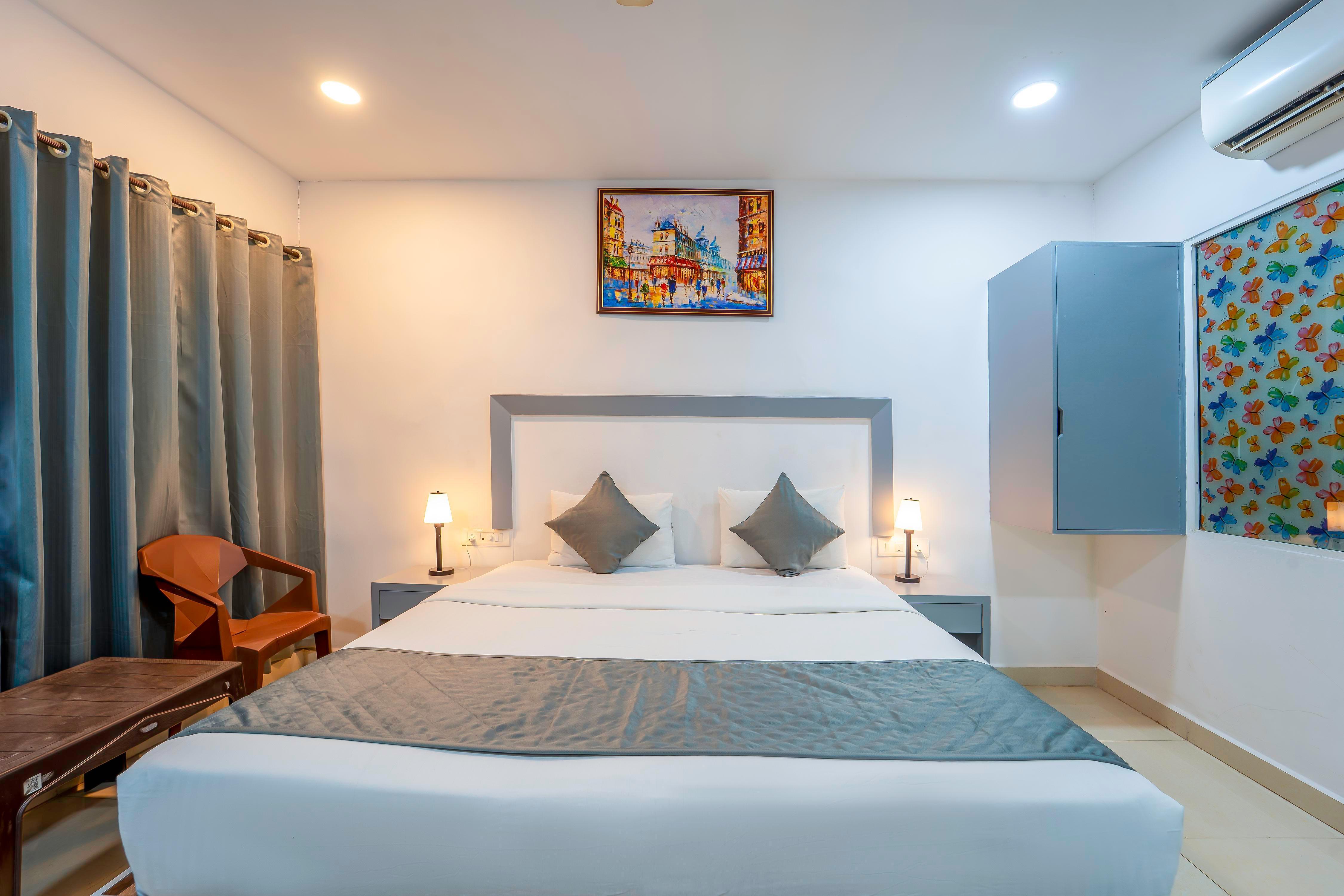Beach Walk Resort Morjim by Feather Touch - Tap to explore photos