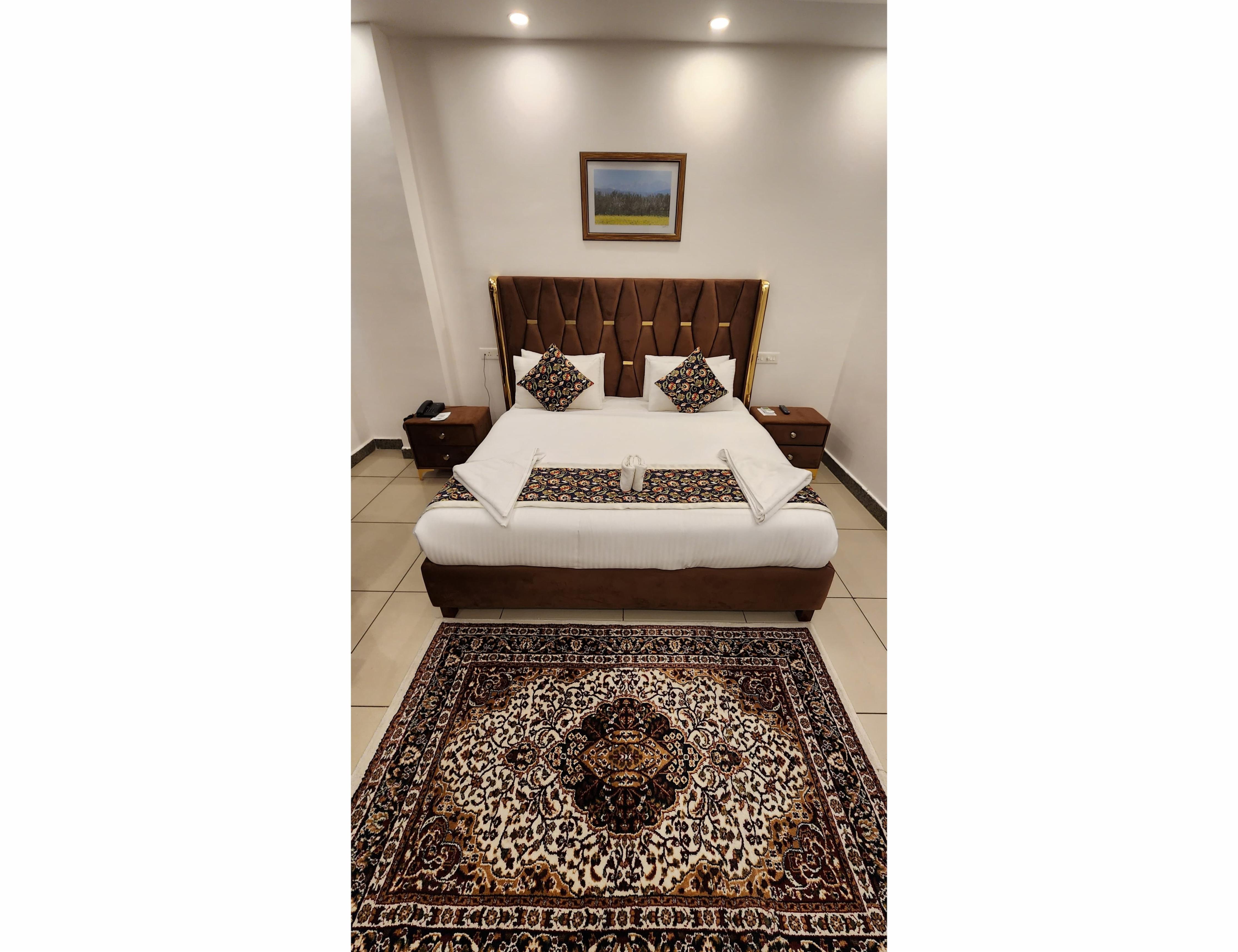 Azizia Inn Room Type - Deluxe Room