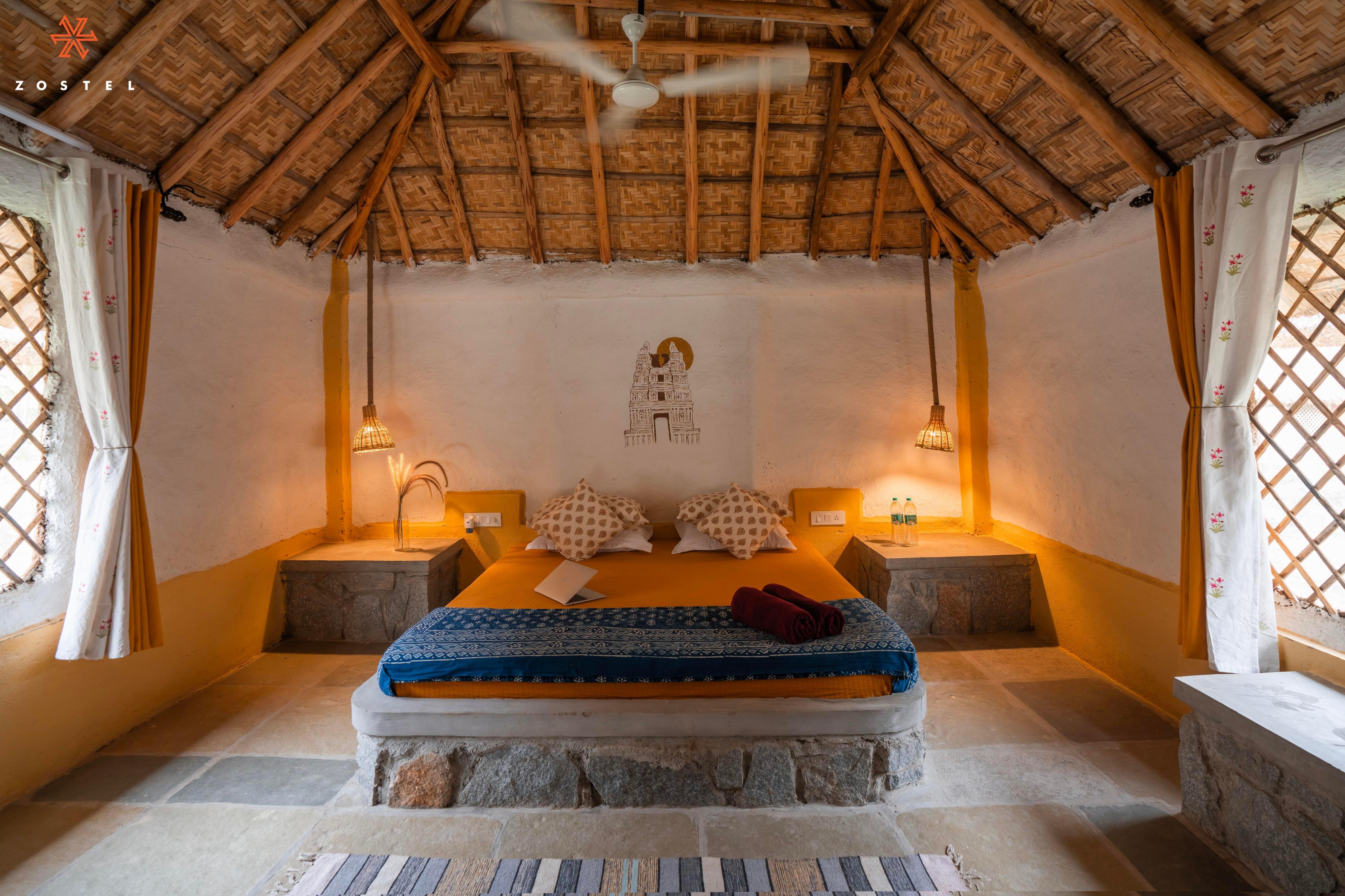 Zostel Hampi (Gangavathi) Room Type - Deluxe Mud Cottage (with private porch and Non AC)