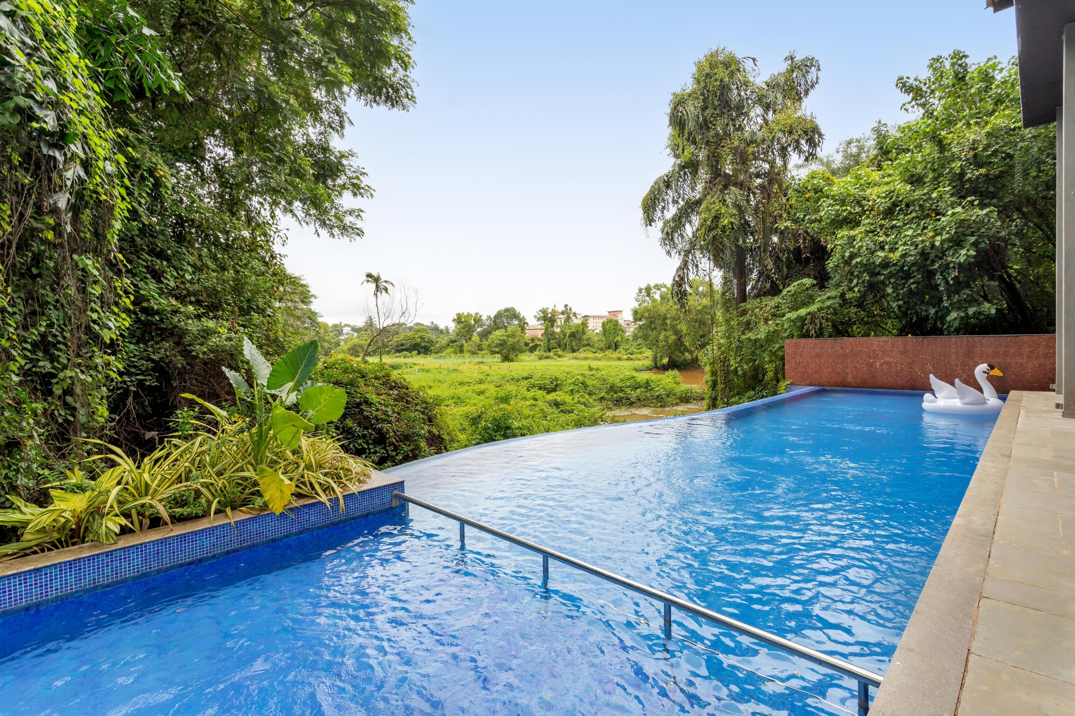 tisyastays | Elegant 1BHK Apartment with Infinity Pool, 5mins to beach - Tap to explore photos