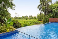 tisyastays | Elegant 1BHK Apartment with Infinity Pool, 5mins to beach