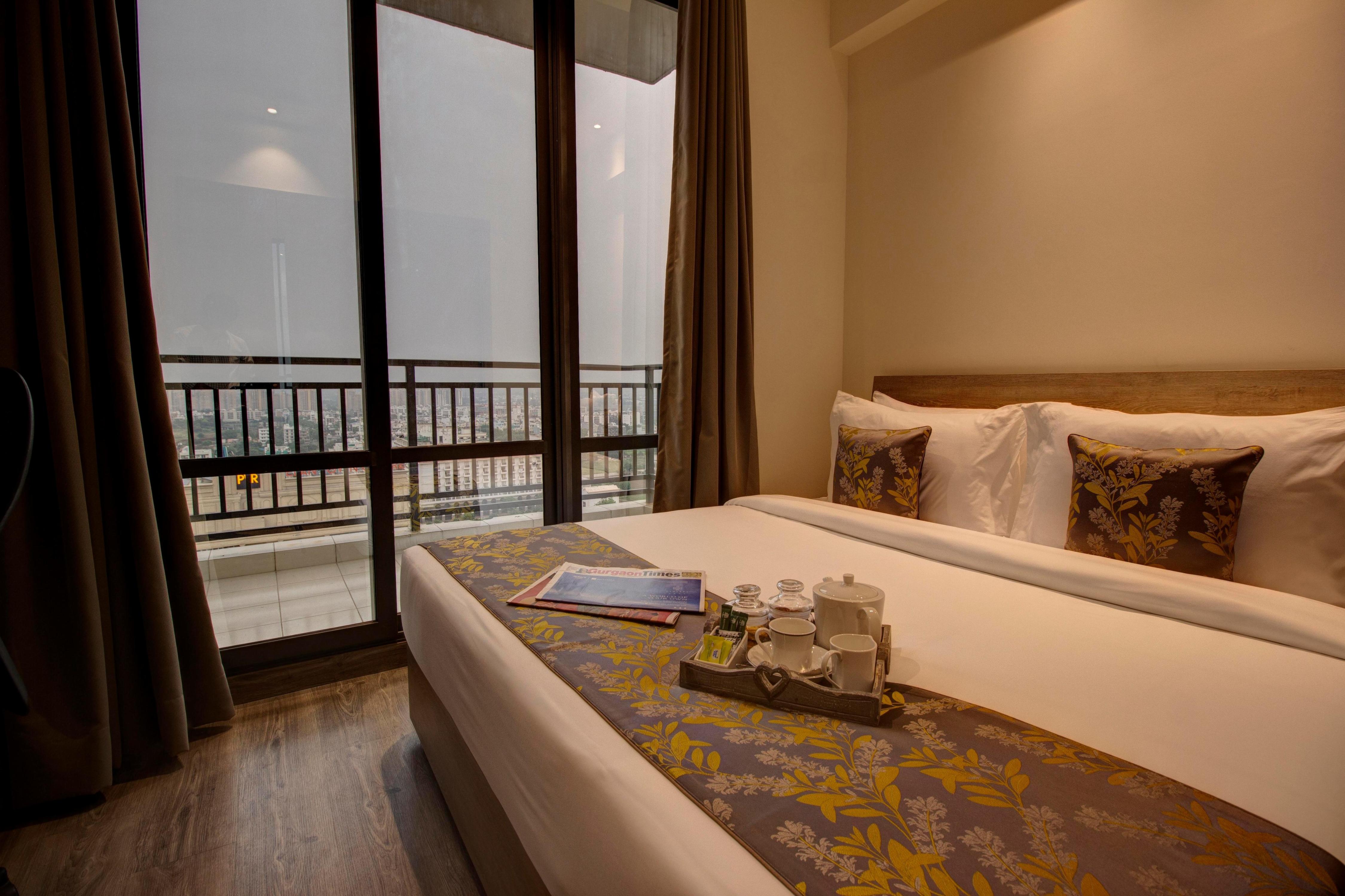 Rhythm Gurugram, Hotel & Suites, Sohna Road - Tap to explore photos