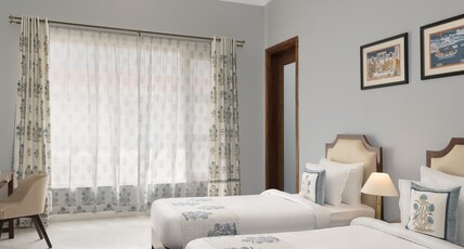 Chez Lavania - A Boutique Stay Room Type - Deluxe Twin Room with Aravali Hills view Chez Lavania - A Boutique Stay Room Type - Deluxe Twin Room with Aravali Hills view