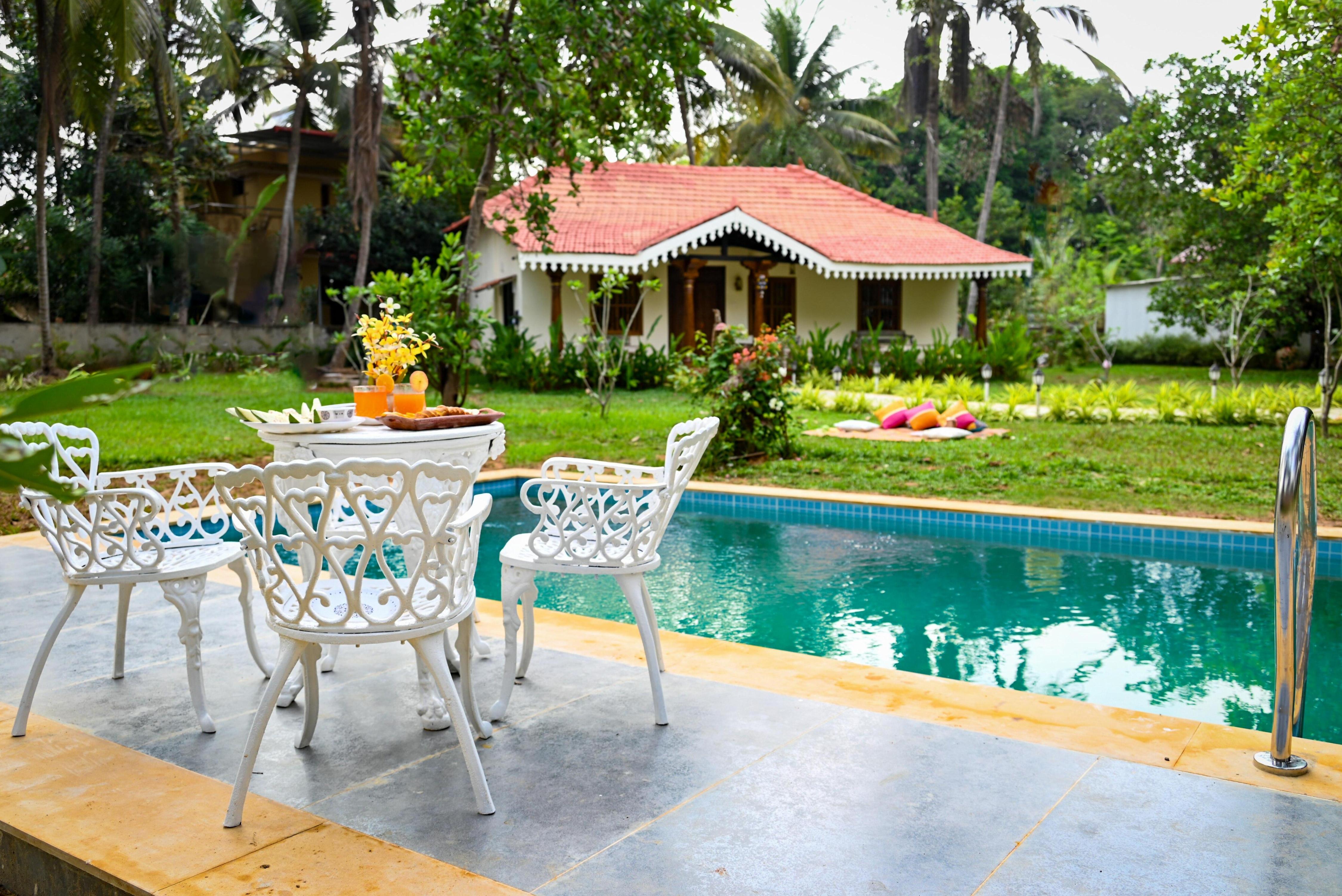 White Serenity Pool Villa Close to Beach Udupi - Tap to explore photos