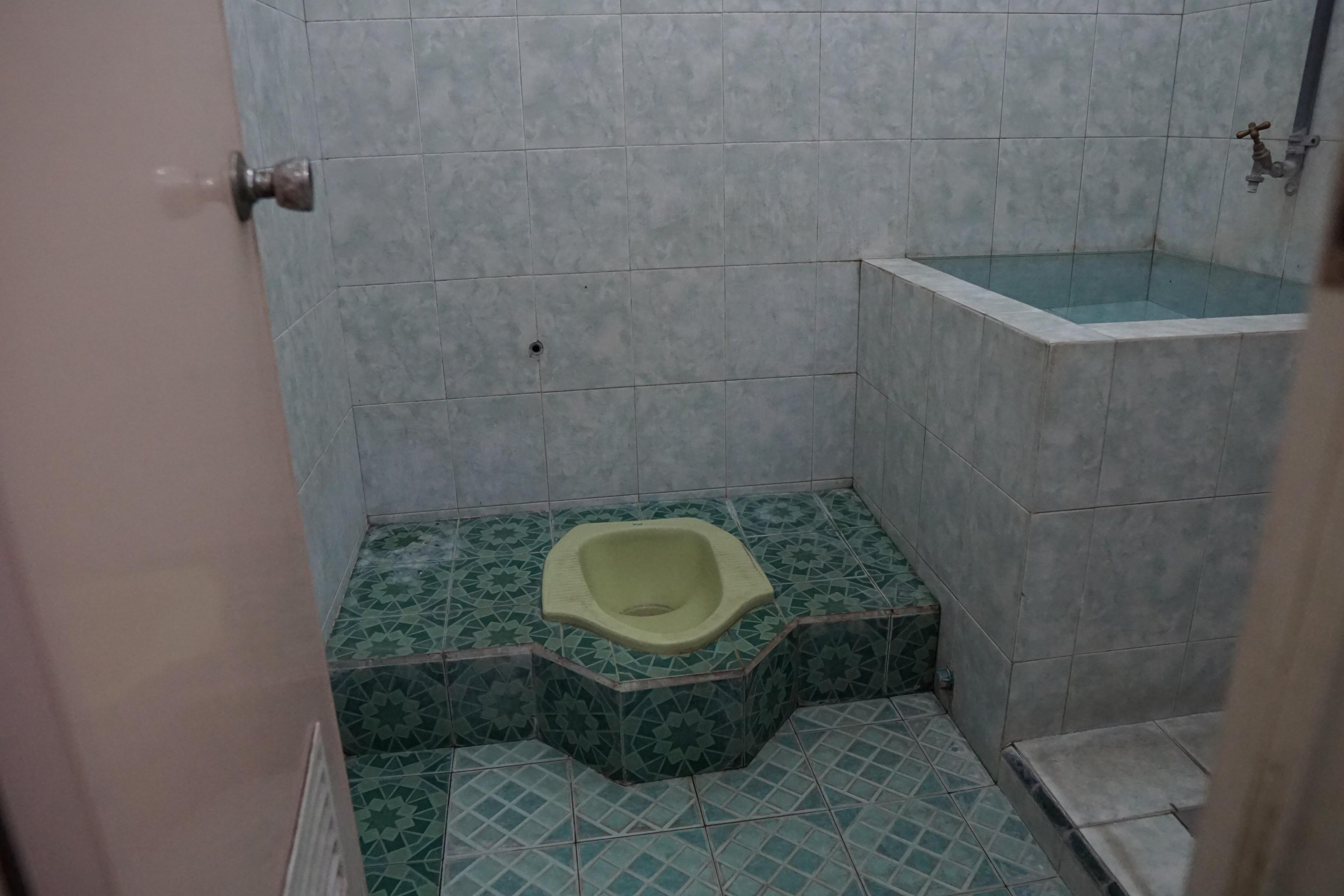 Hotel O Yoko Kost Syariah - Tap to explore photos