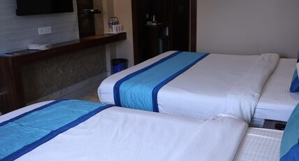 HOTEL AMBIKA PALACE, 150mtrs FROM GOLDEN BEACH Room Type - PREMIUM ROOM (2 Double Bed with City view) HOTEL AMBIKA PALACE, 150mtrs FROM GOLDEN BEACH Room Type - PREMIUM ROOM (2 Double Bed with City view)