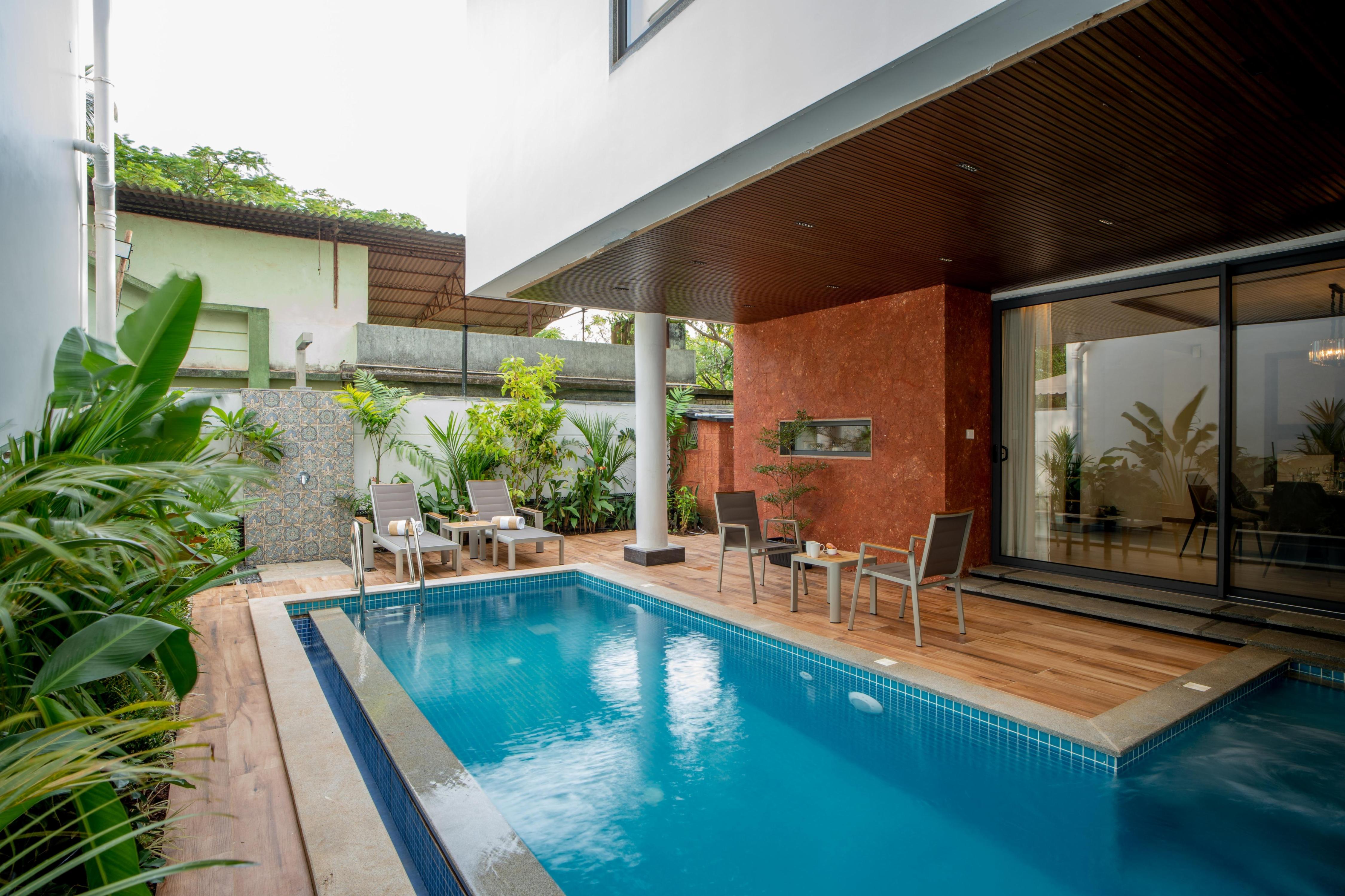 ELIVAAS Signature Cloud 7 | 4 BHK Villa with Pvt Pool - Tap to explore photos