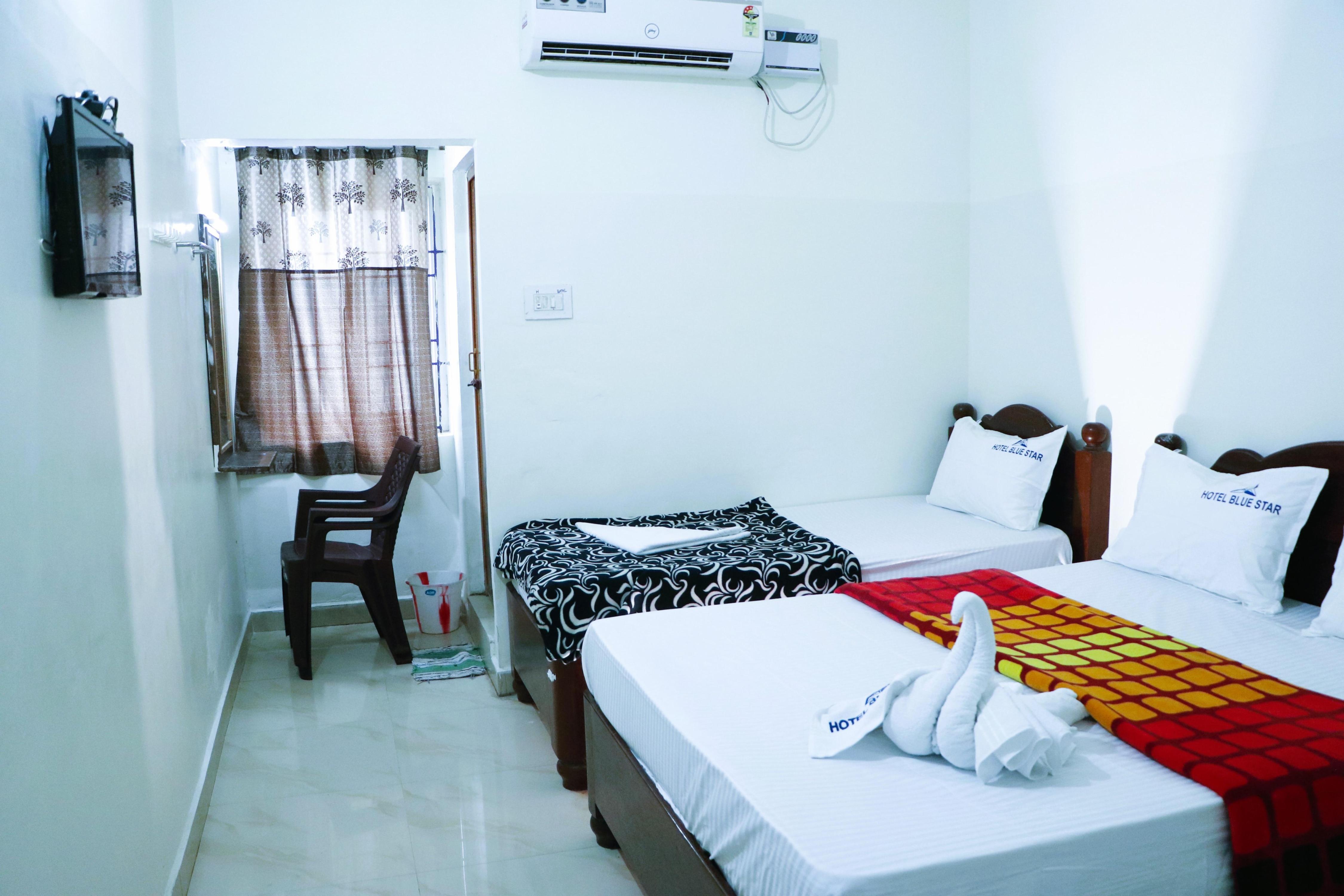 HOTEL ANNAMALAII Room Type - Standard Triple Bed AC