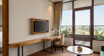 Ramada Encore by Wyndham Amritsar Airport Road Room Type - Junior Suite , King Bed, Living Room with Private Balcony Ramada Encore by Wyndham Amritsar Airport Road Room Type - Junior Suite , King Bed, Living Room with Private Balcony