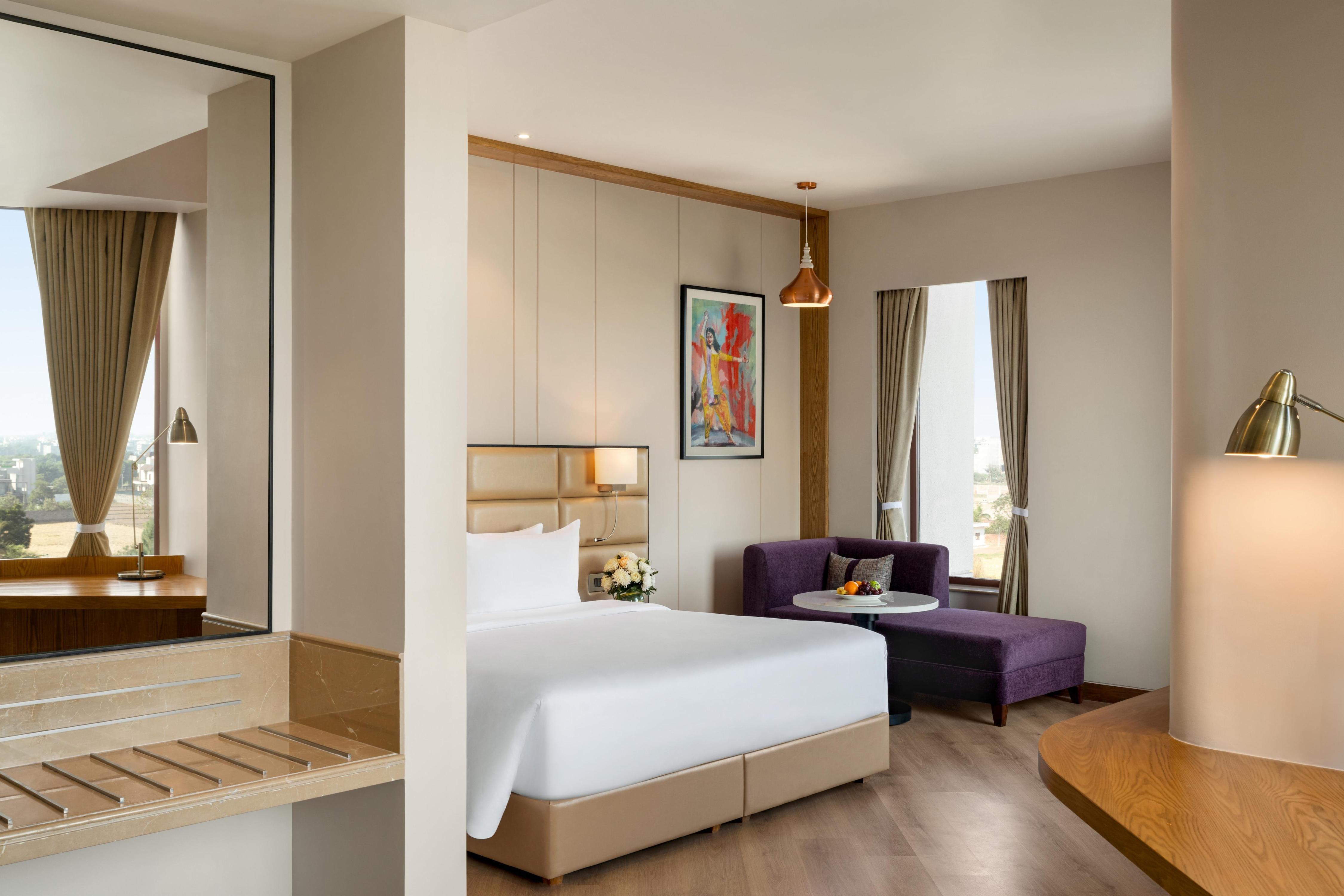 Ramada Encore by Wyndham Amritsar Airport Road - Tap to explore photos