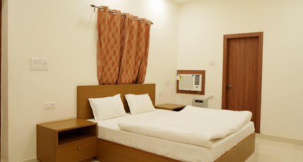 Apoorva Guest House Room Type - Mini Deluxe Room