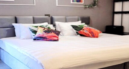 Capital O 75422 Million Pillows Room Type - Deluxe Double