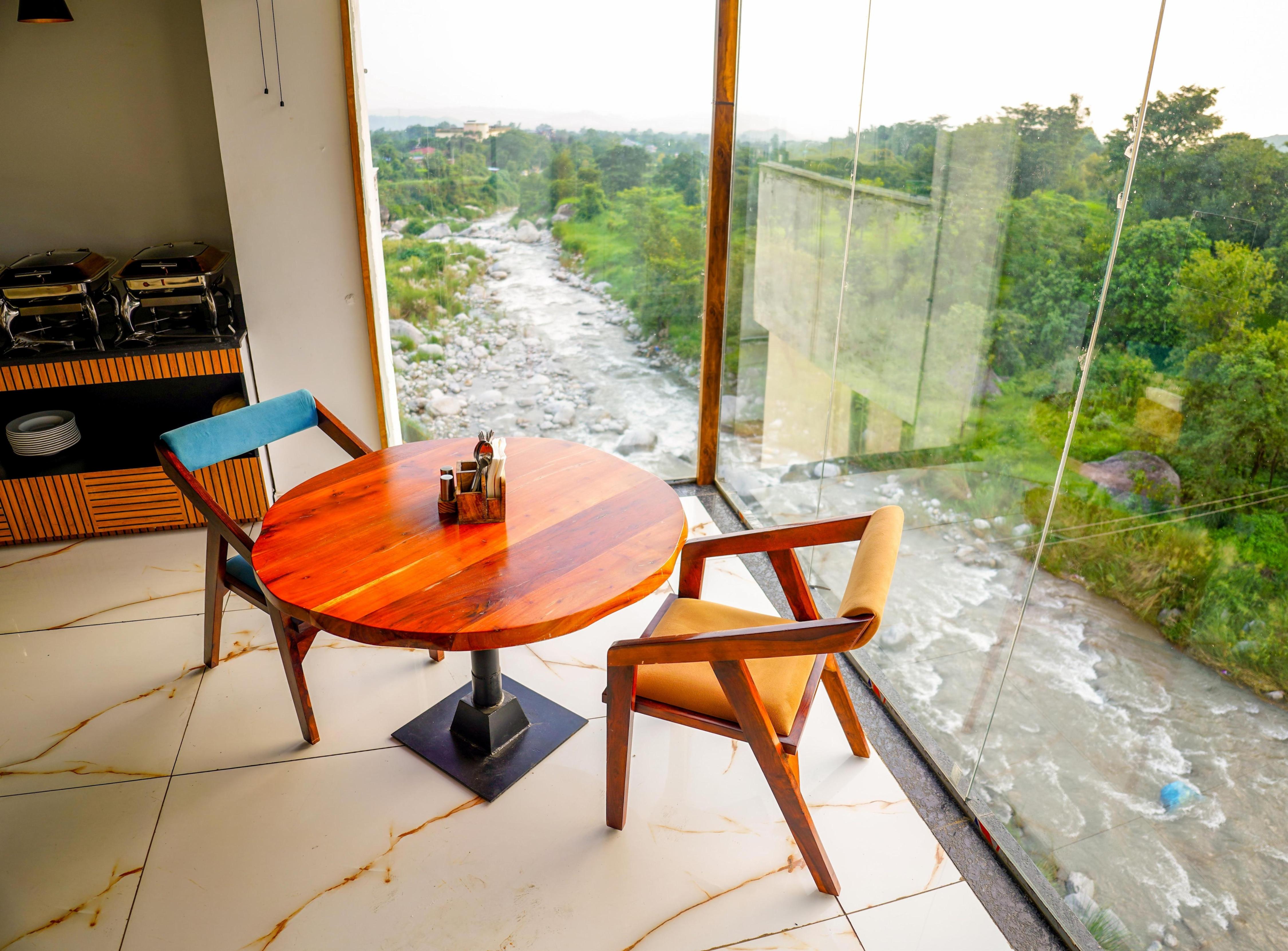 Aachman Riviera  | A Riverside Hotel - Tap to explore photos