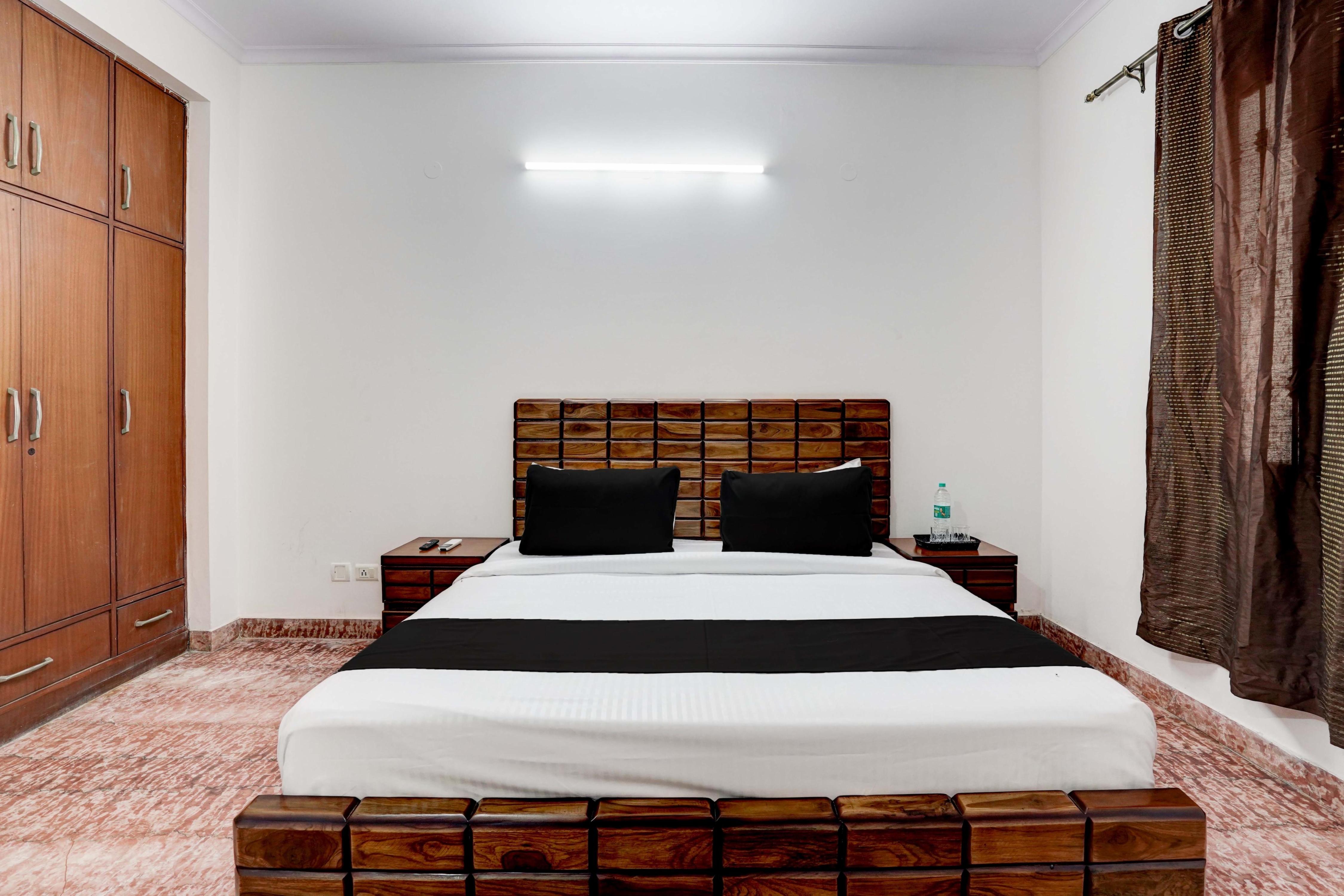 Hotel O Dev Villa - Tap to explore photos