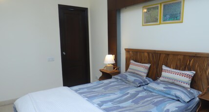 Sliceinn Orchid Room Type - Premium bedroom with attached bathroom and balcony - 102