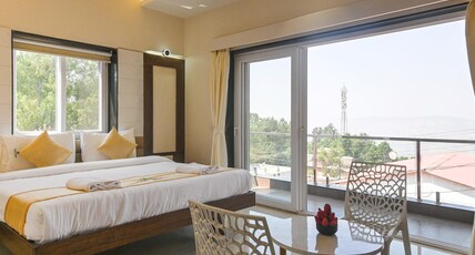 Forest Breeze Inn, Mahableshwar, Panchgani Room Type - Deluxe double room with balcony