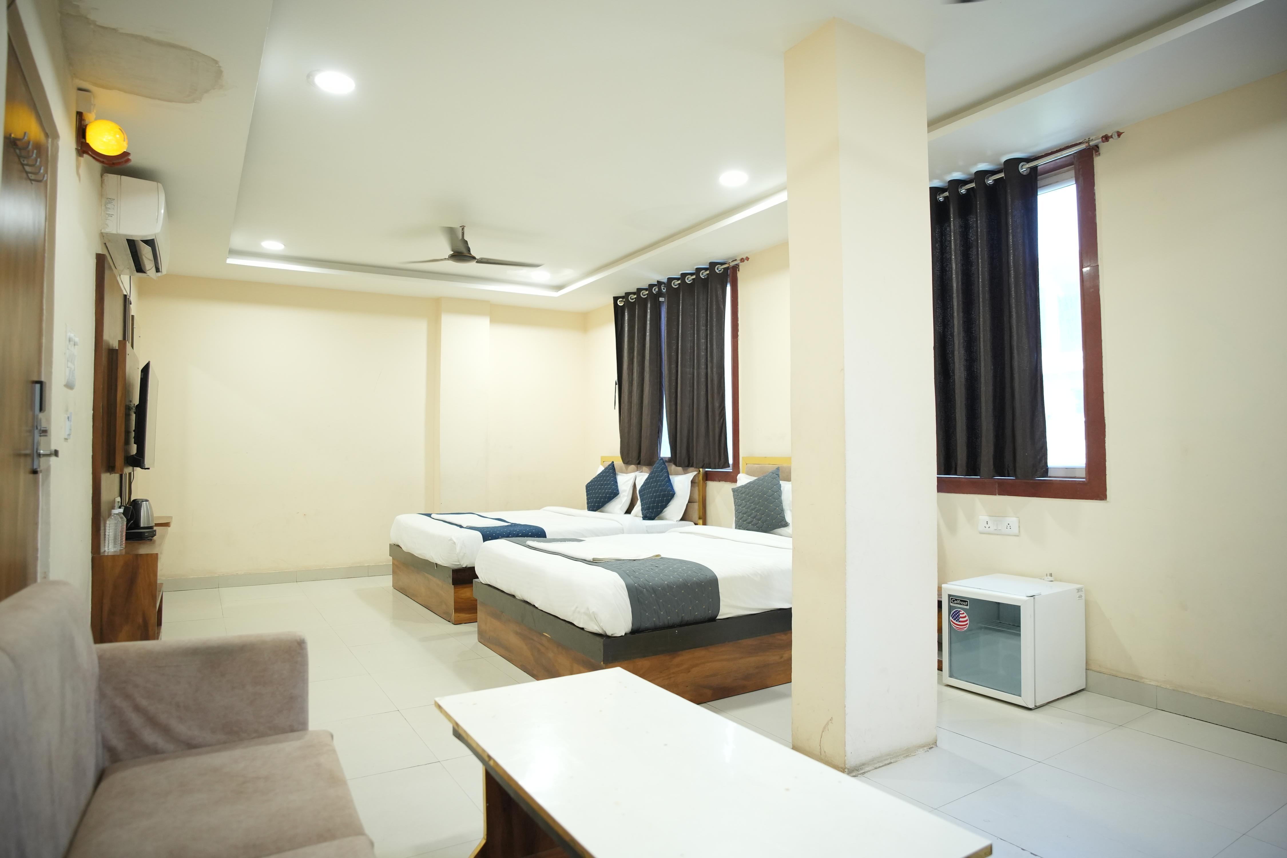 Rudra Inn | Near Kashi Vishwanath Temple - Tap to explore photos