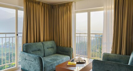 Golden Munnar Palace By Hawk Hospitality Room Type - Golden Suite Non-AC with Balcony Golden Munnar Palace By Hawk Hospitality Room Type - Golden Suite Non-AC with Balcony
