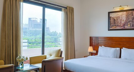 The Hoften Elite 32 Avenue, Sector 15, Gurugram Room Type - Suite Room with Private Balcony