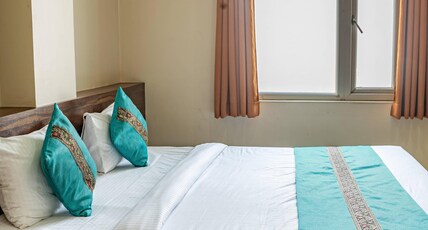 HOTEL NANDINI GRAND Room Type - Deluxe Room HOTEL NANDINI GRAND Room Type - Deluxe Room