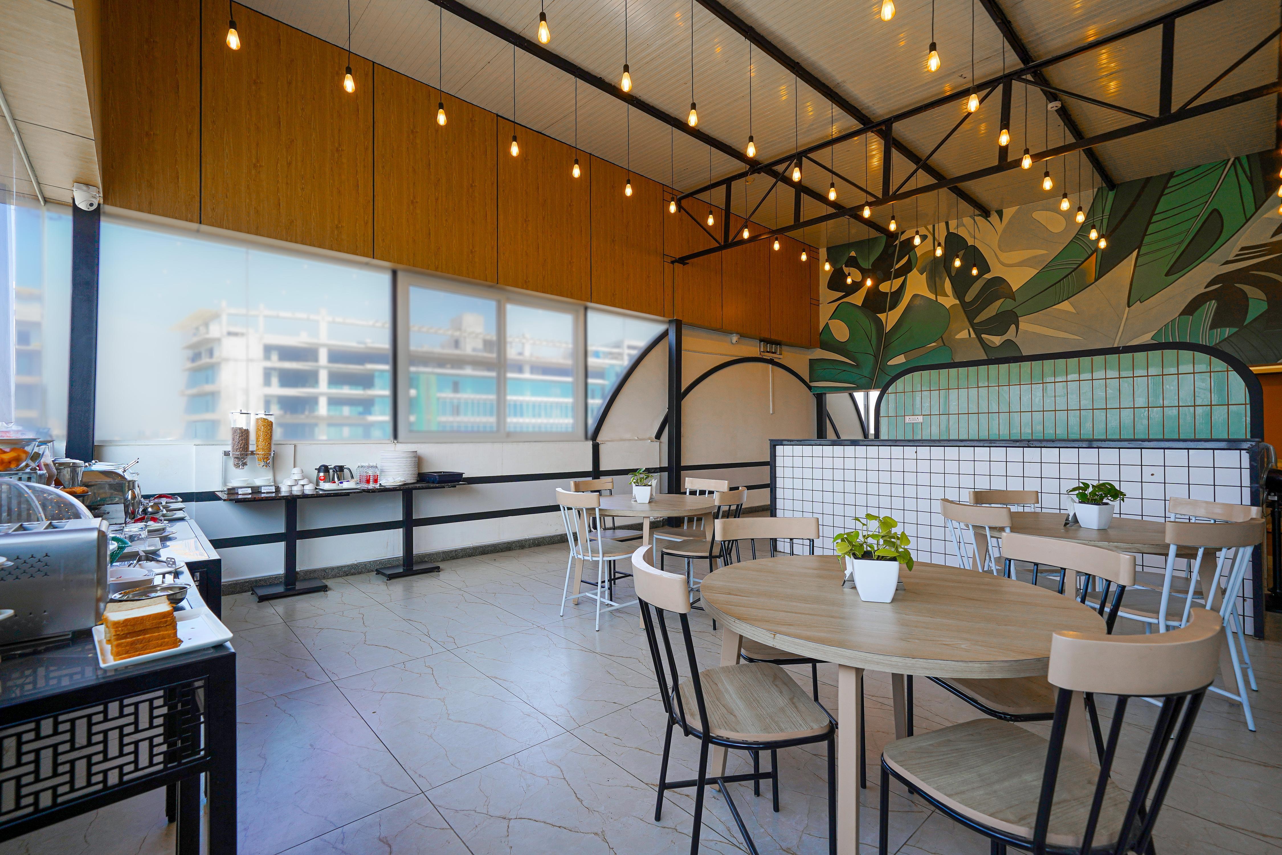 Olive Hotel Hebbal by Embassy Group - Tap to explore photos