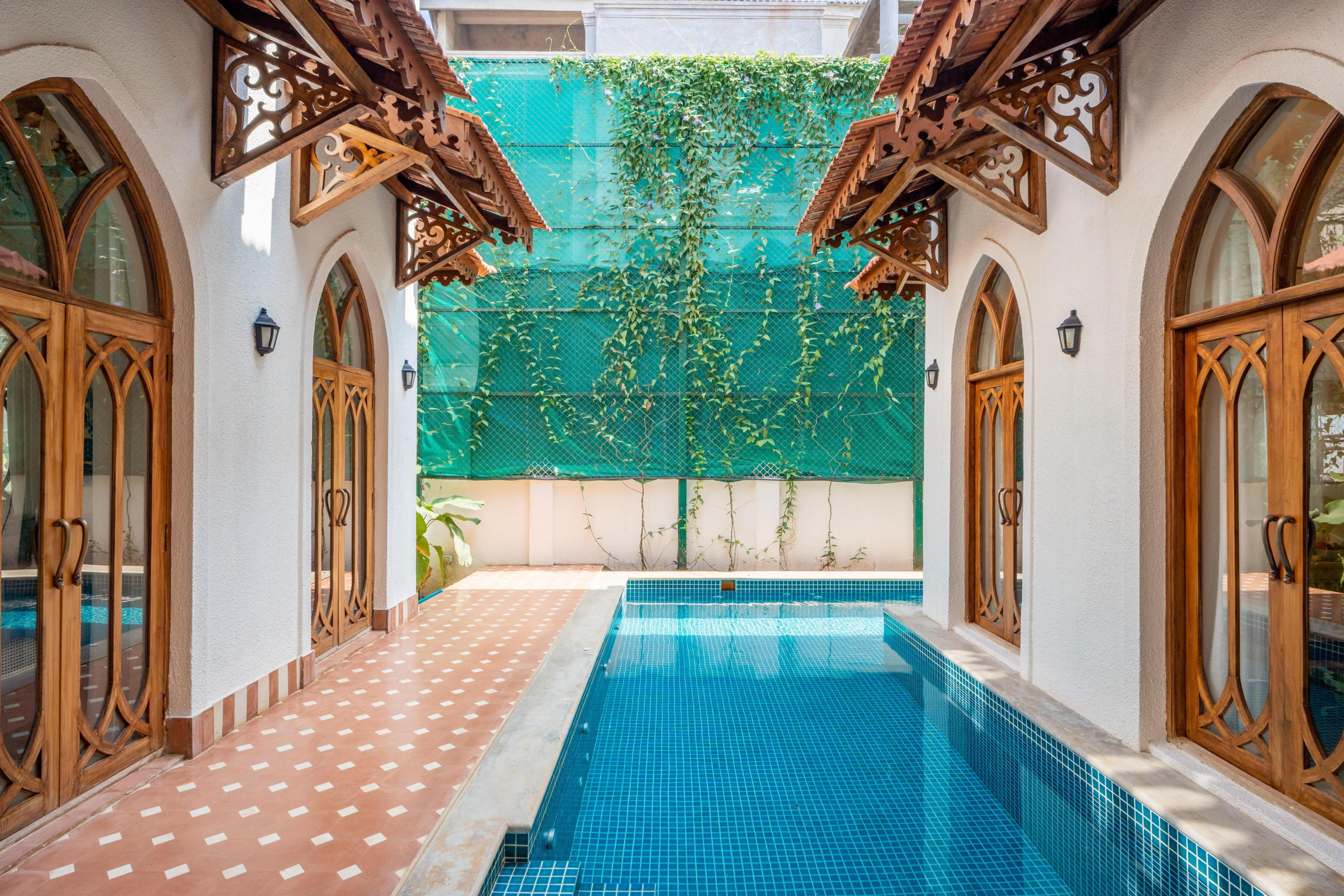 ELIVAAS Signature ELIVAAS 4 BHK with Pvt Pool & Media Room | Samukha - Tap to explore photos