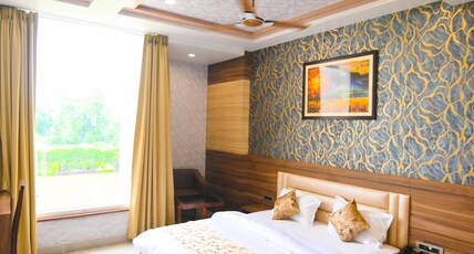 HOTEL TRIMURTI Room Type - Premium Rooms