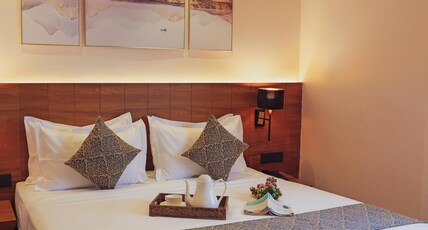 The Novello by Hotel Evergreen Room Type - DELUXE ROOM The Novello by Hotel Evergreen Room Type - DELUXE ROOM