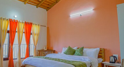 Oak Anandam | A Homlee Stay Room Type - Deluxe- Hill View
