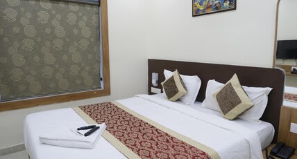 Hotel SJ Pride Inn Room Type - Super Deluxe AC Hotel SJ Pride Inn Room Type - Super Deluxe AC