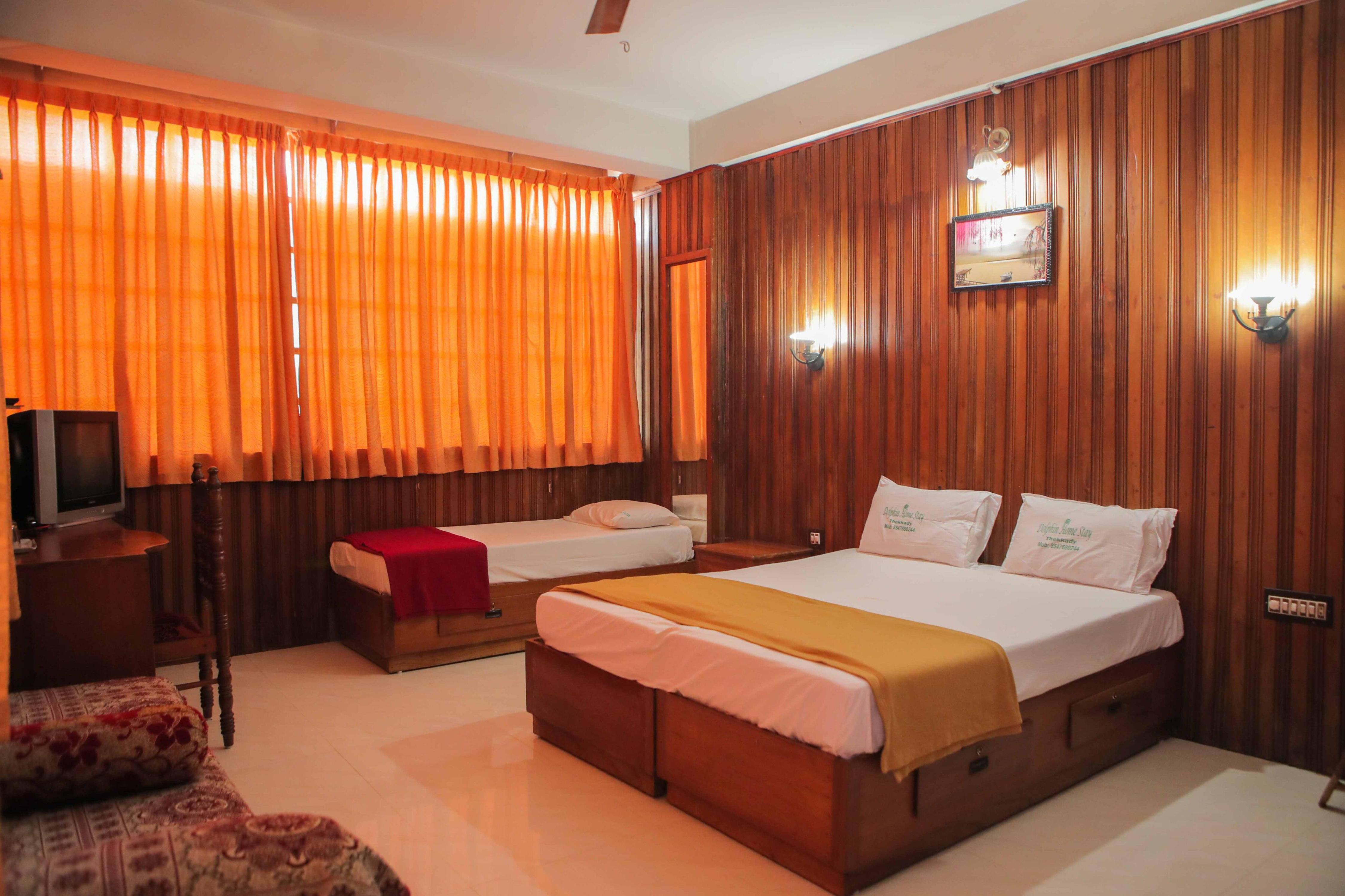 Thekkady Dolphin Residency Room Type - Triple Bedded Room AC/NON AC