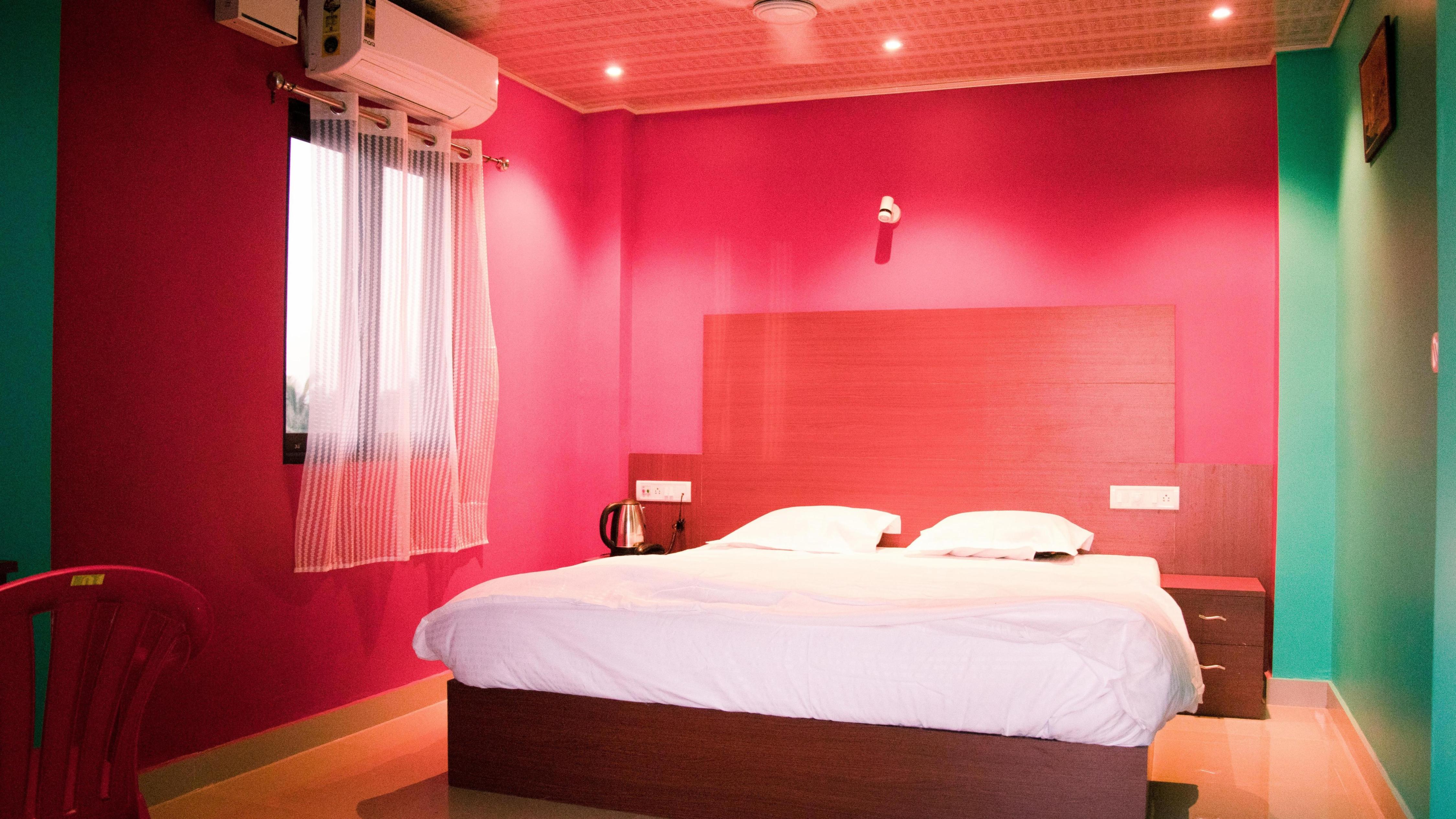 Malar Inn BNB Room Type - Deluxe Room NON AC