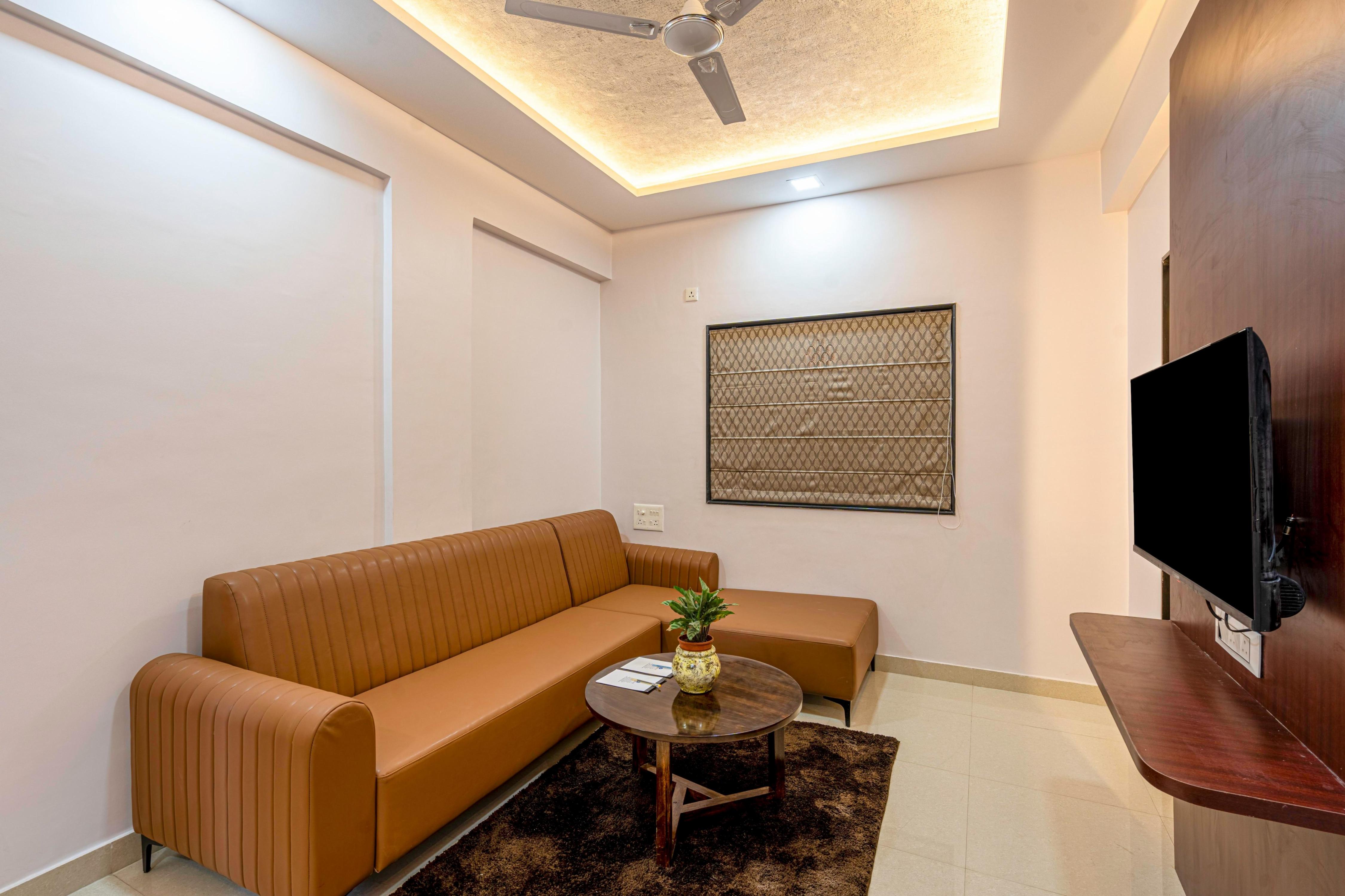 StayBird Divine Suites Business Hotel - Tap to explore photos