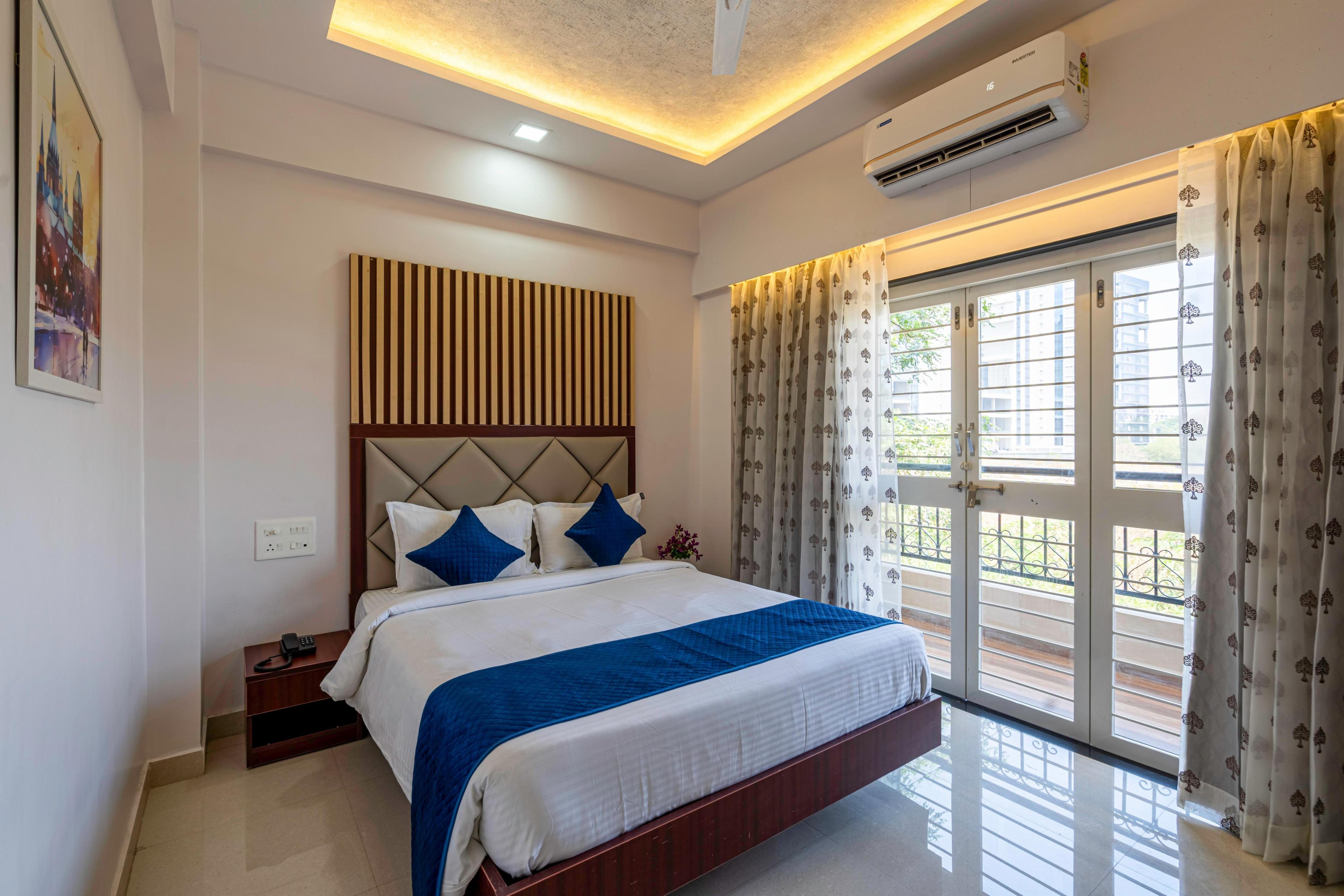 StayBird Divine Suites Business Hotel - Tap to explore photos
