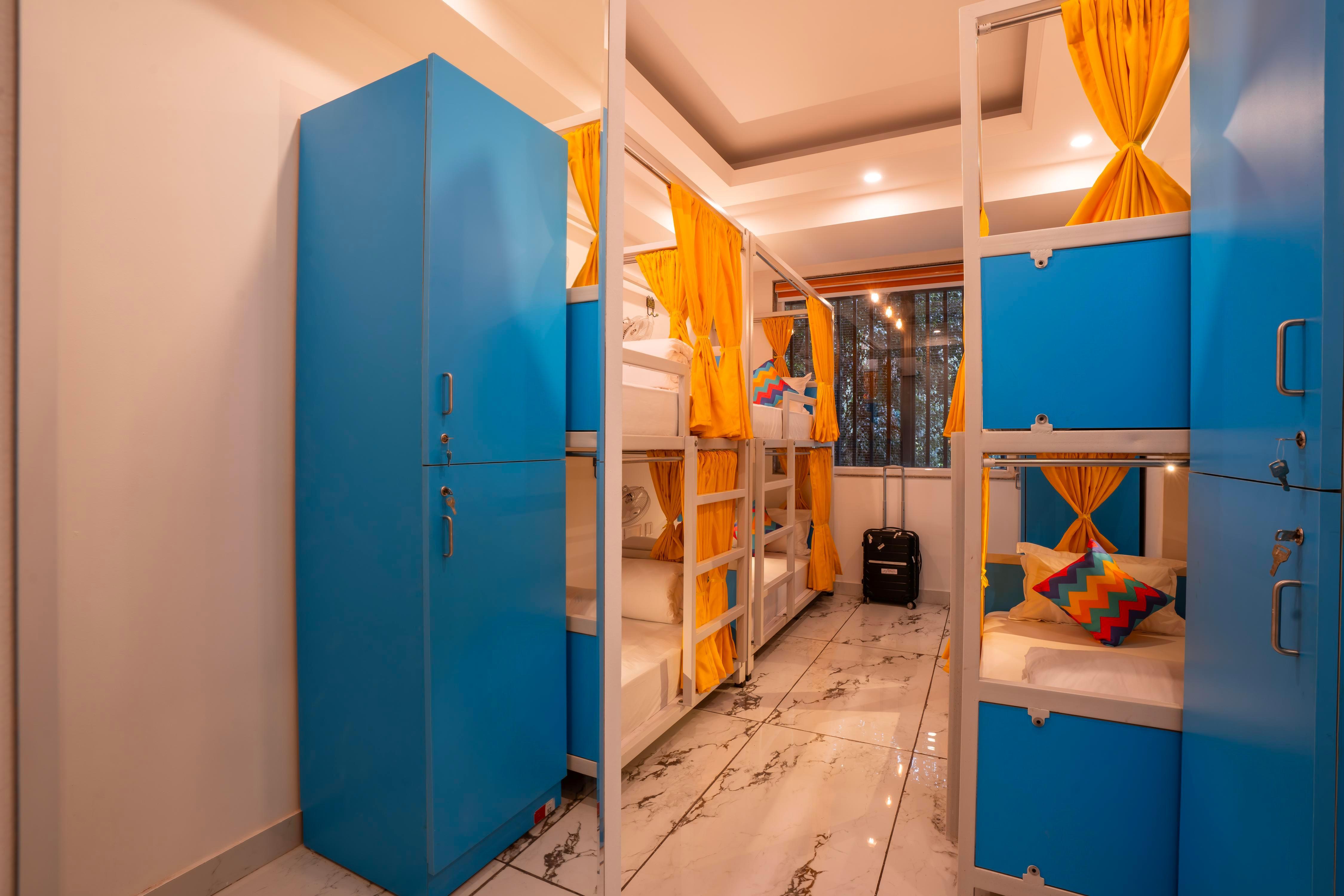 goSTOPS Gurugram, Baani Square PLUS - Private Rooms & Dorms Room Type - Bed in 6 Bed Mixed AC Dormitory Room with Balcony and Ensuite Bathroom