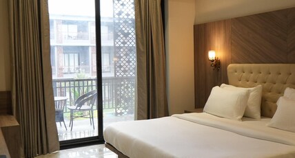 Mansa Club and Resort Ujjain Room Type - Junior Suite Room with Pool view and Balcony
