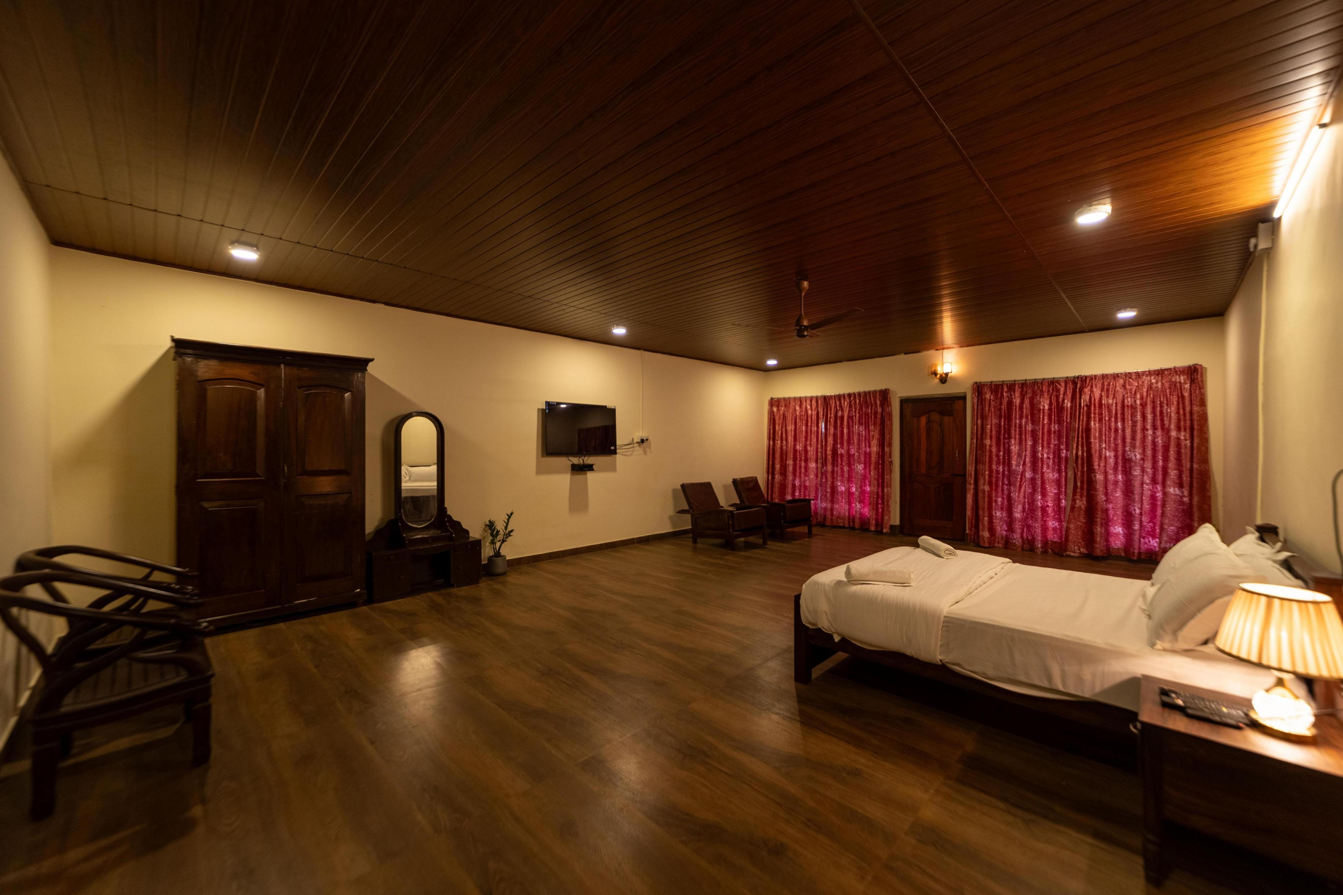 Harris Holiday Inn Valparai - Tap to explore photos