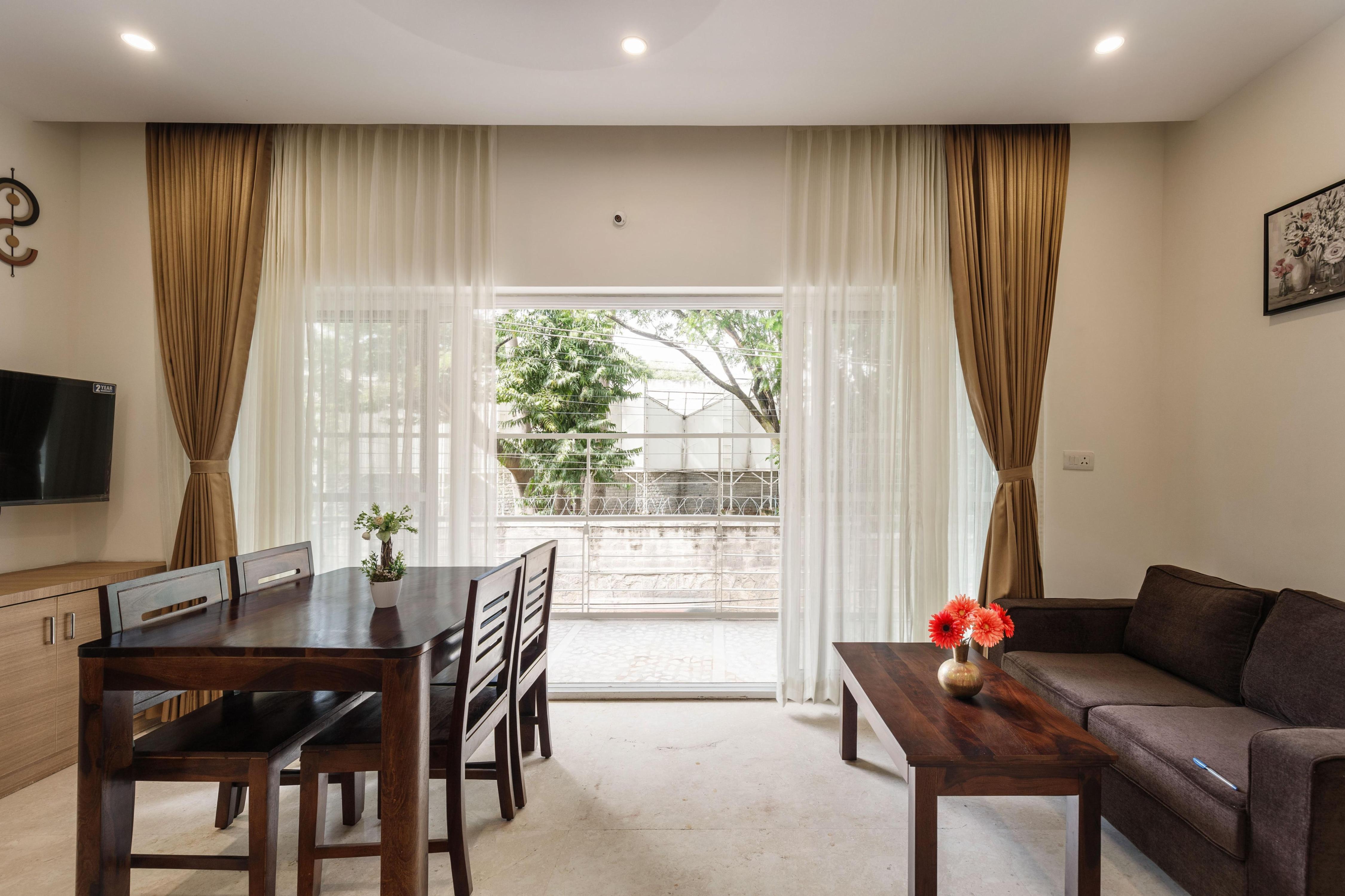 Sunlight 2 BHK Serviced Apartment l By MistyBlue - Tap to explore photos