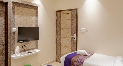 Hotel Omkar International Room Type - Deluxe Room