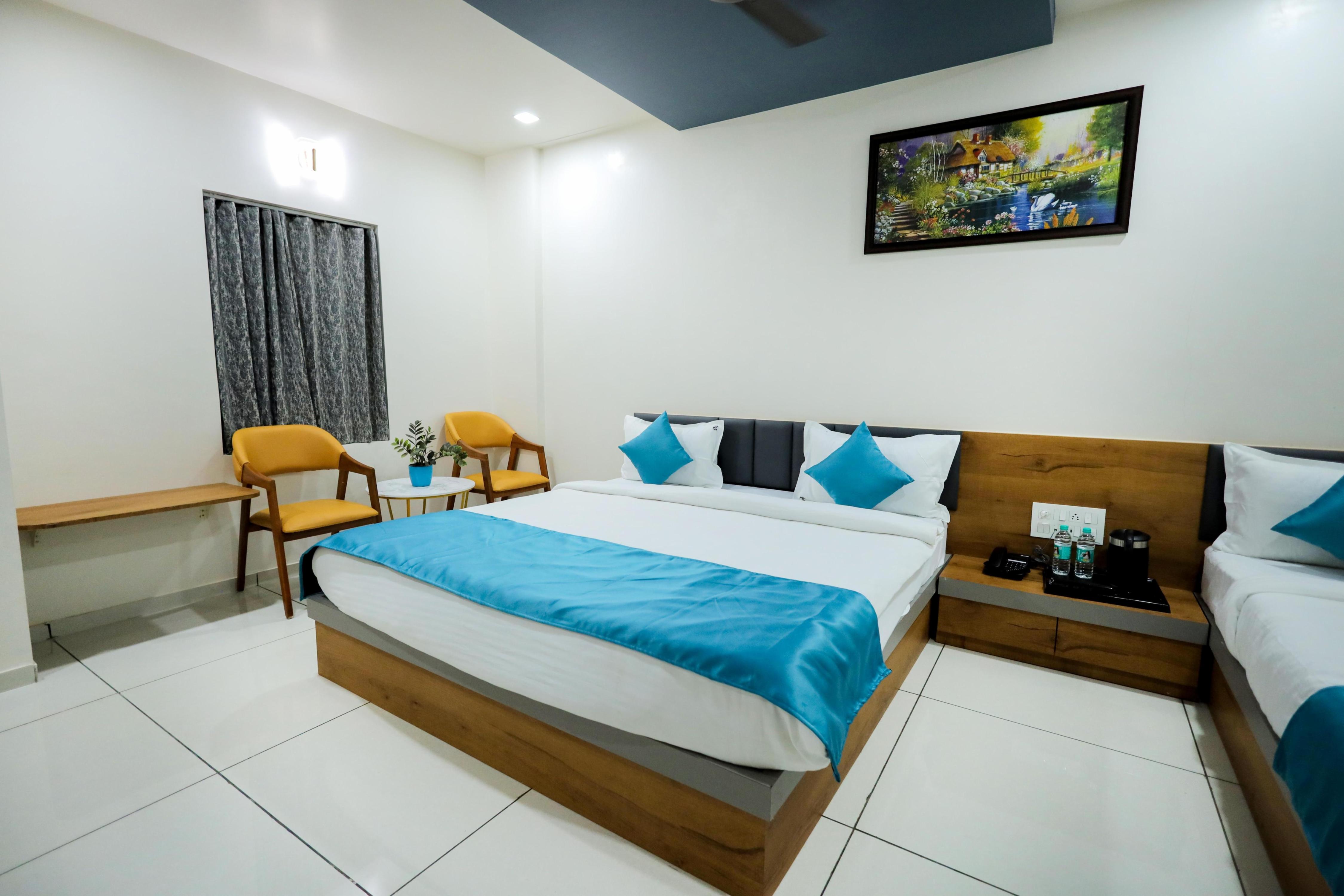 Hotel The Premier Somnath - Tap to explore photos