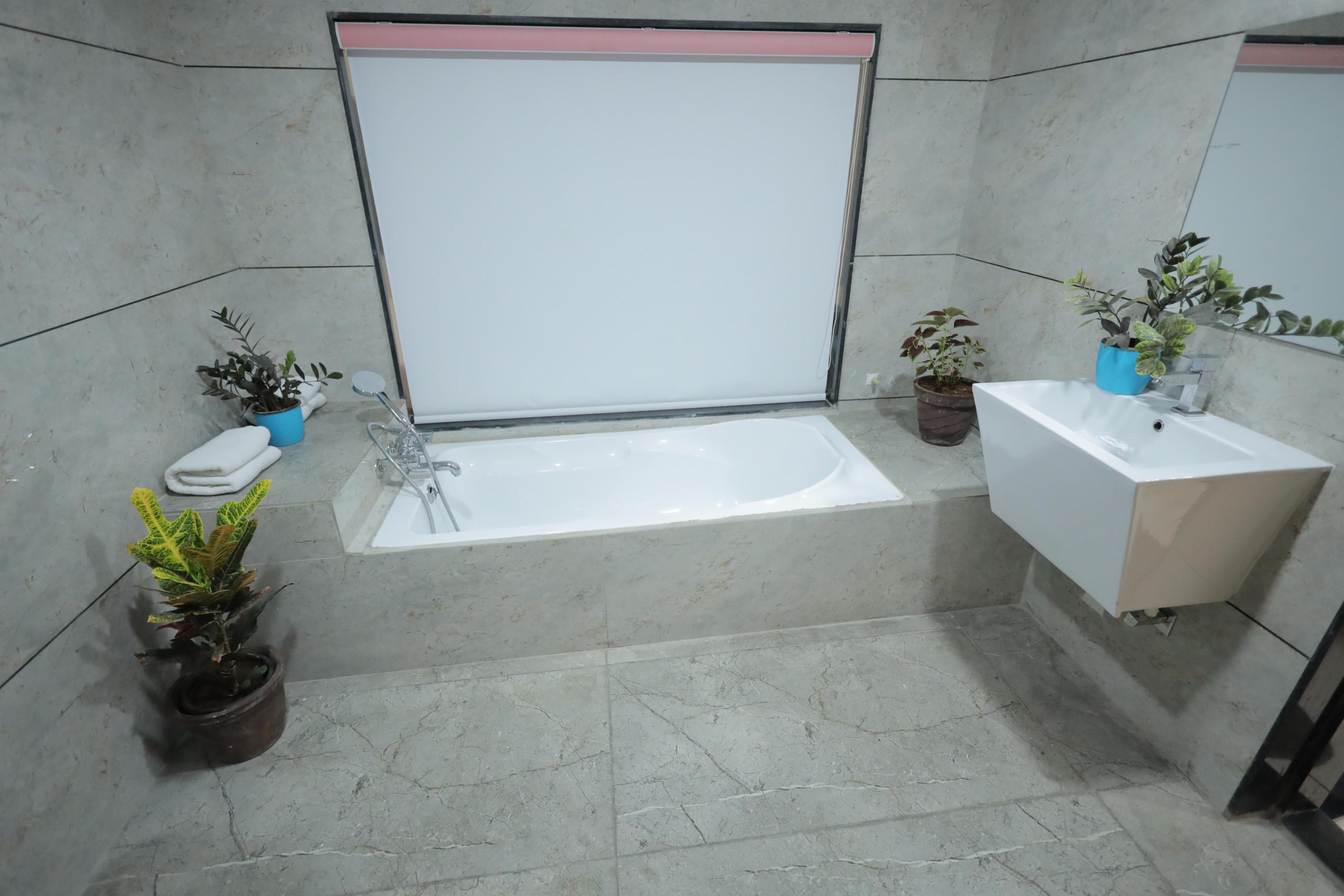 Hotel The Premier Somnath - Tap to explore photos