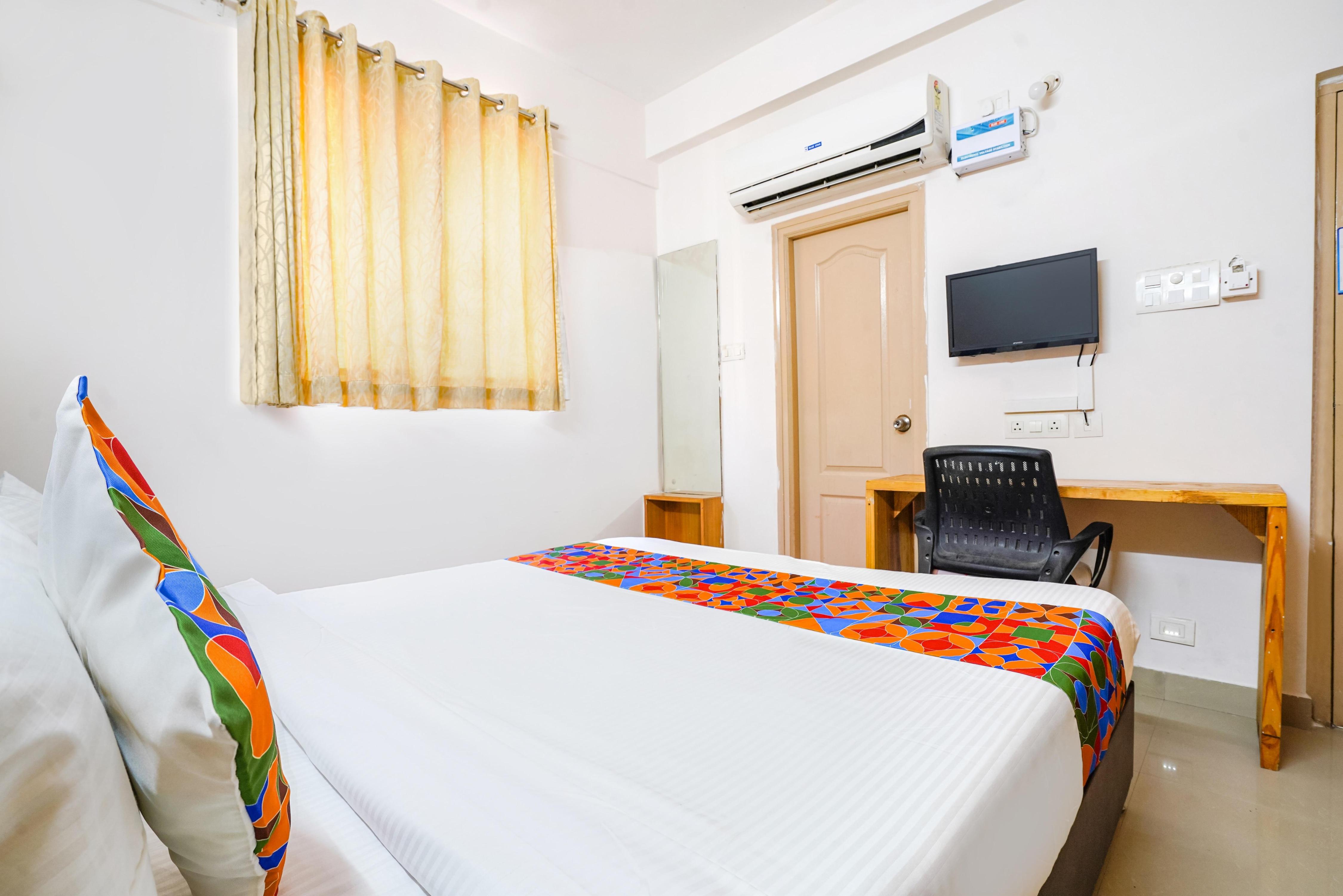 FabHotel Blue Dawn Suites - Tap to explore photos