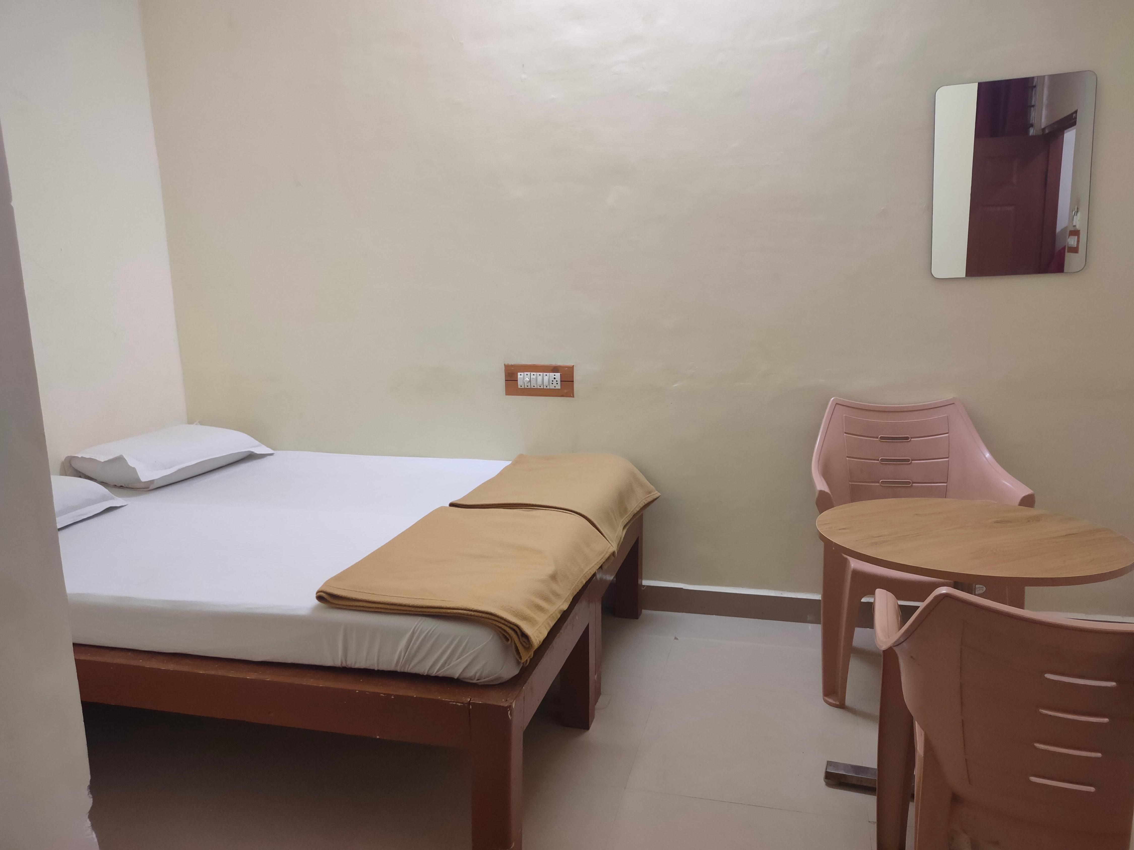 Hotel Sri Shakti Priya Room Type - AC Deluxe Bedroom