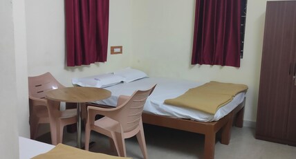 Hotel Sri Shakti Priya Room Type - Deluxe Double AC BEDROOM with Single Bed