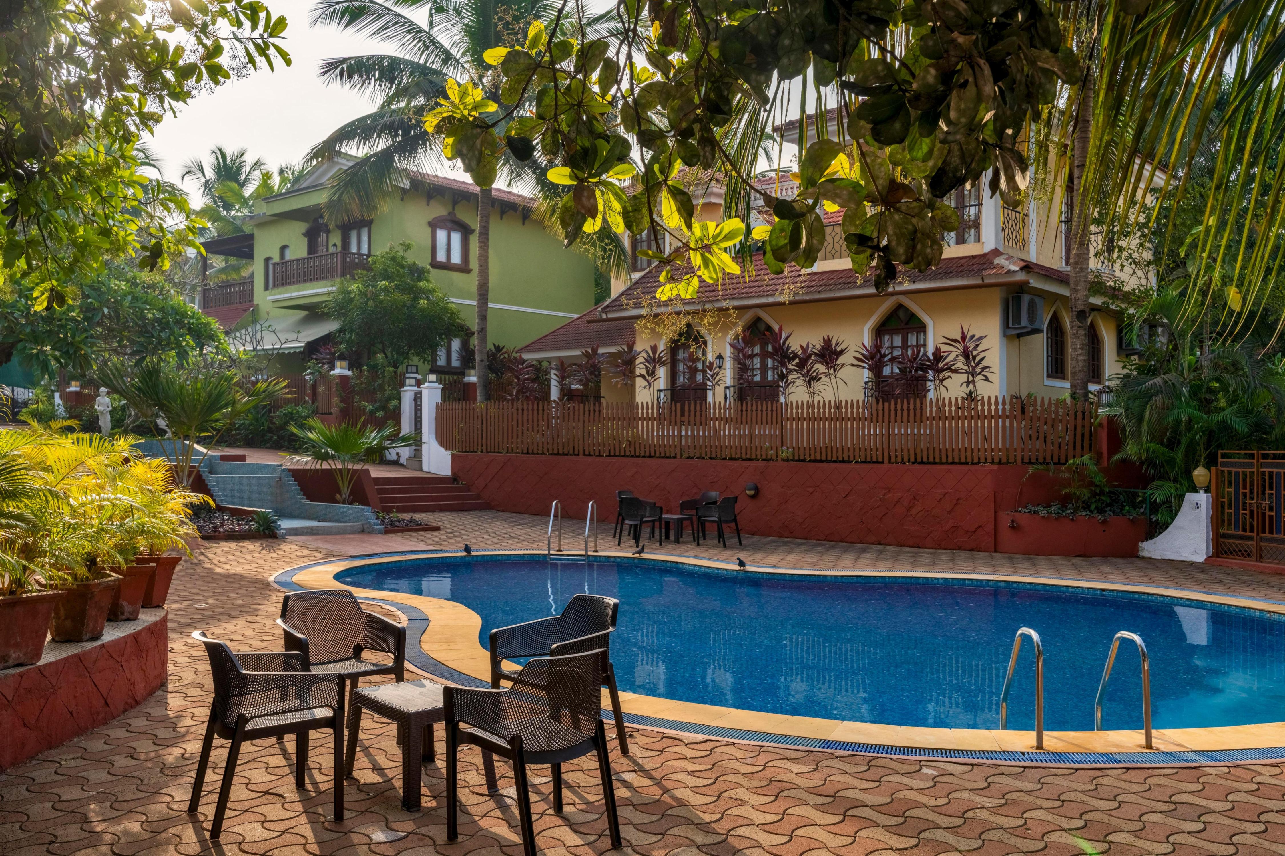 Villa Bliss by The Blue Kite - 4BHK Villa with Pvt Pool, Balcony 5 mins away from Candolim Beach(B7) - Tap to explore photos