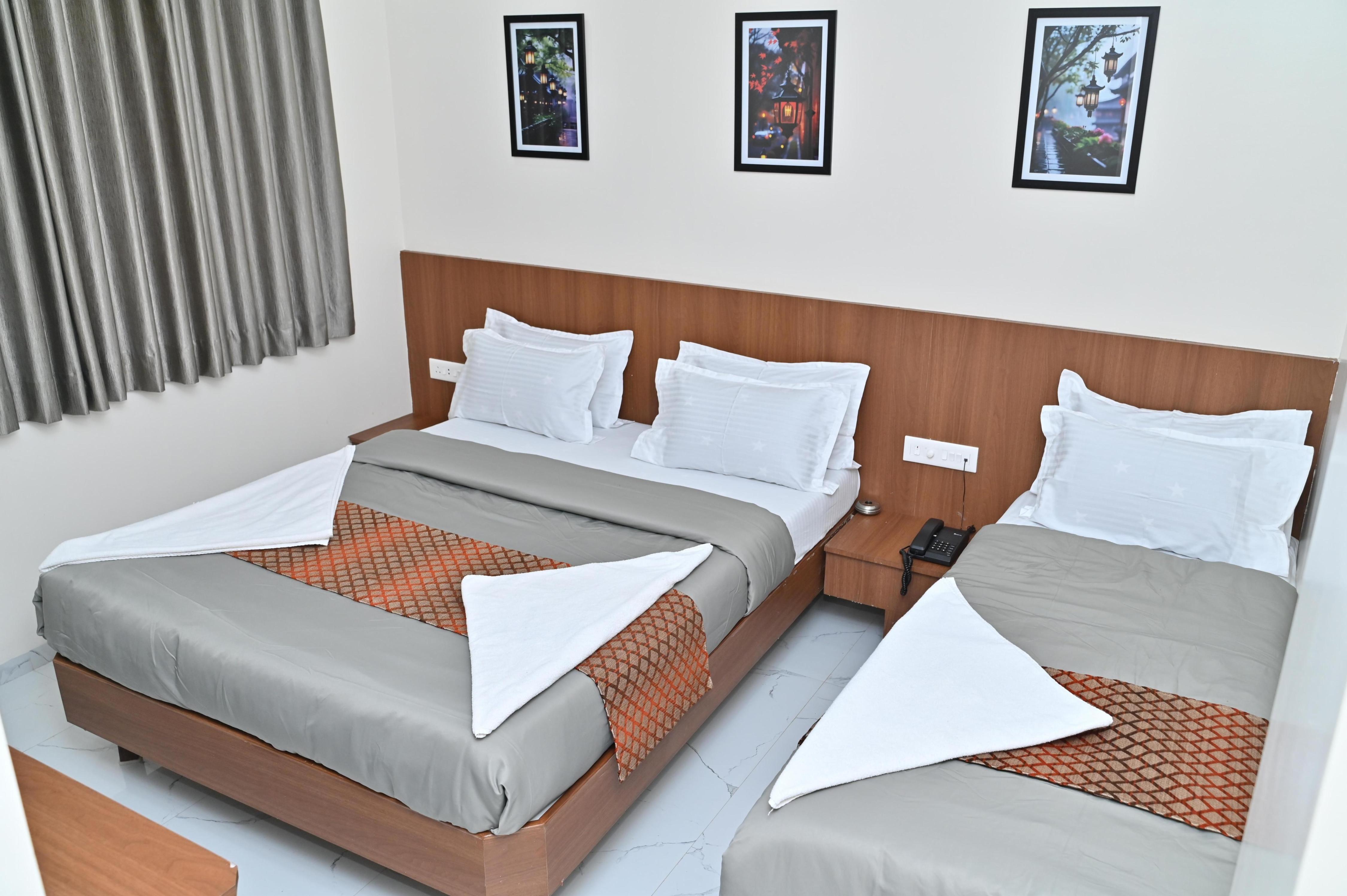 Hotel Sai Sneha Room Type - Executive triple bed
